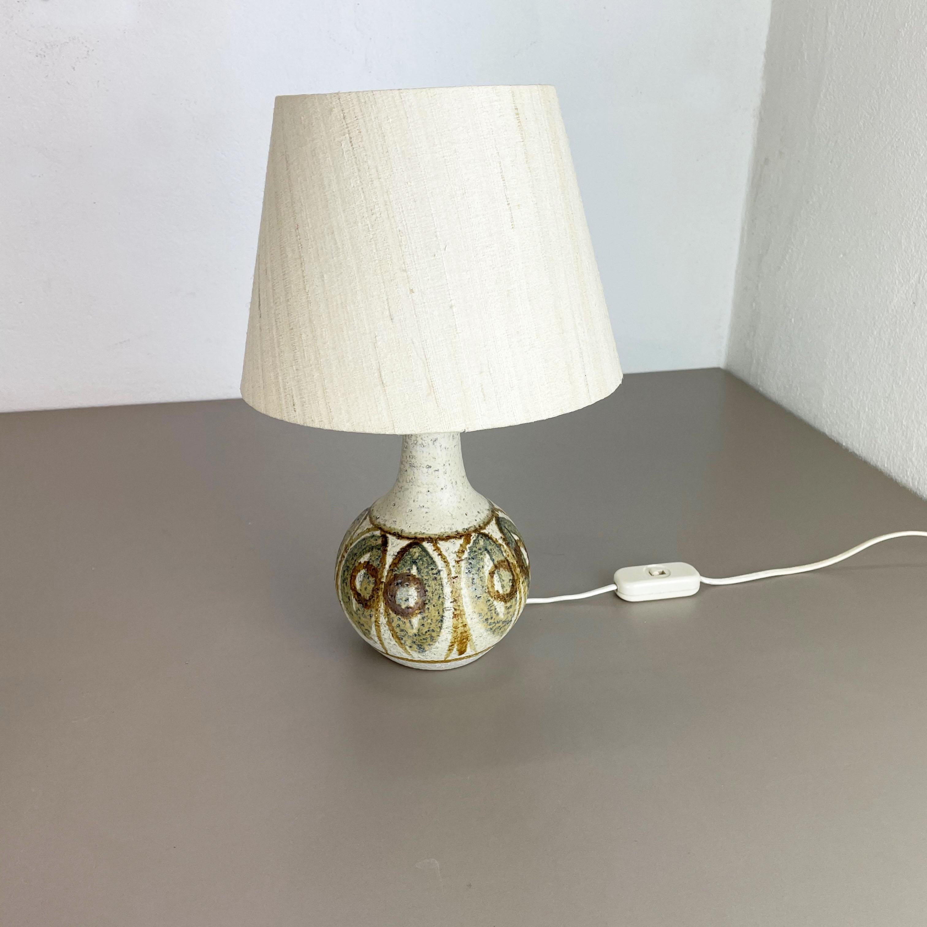 Article:

Ceramic table light base


Producer:

SOHOLM, Denmark




Decade:

1970s





This original vintage ceramic Pottery light base was designed and produced by SOHOLM in Denmark in the 1970s. It is made of solid pottery and has a nice abstract
