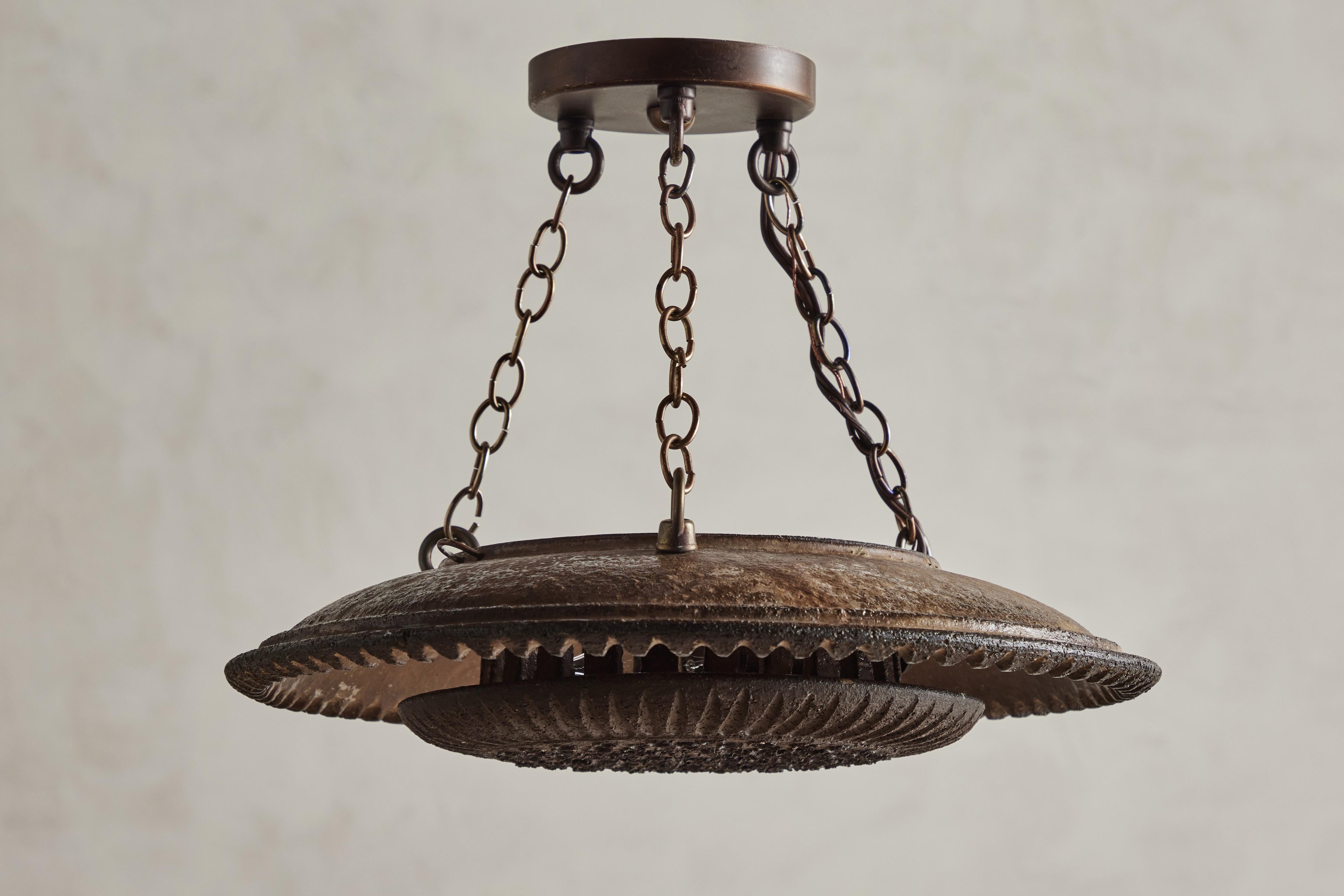 Vintage ceramic “Sun” pendant by Lovemose Keramik. The original wall sconce was converted to a pendant with a new ceiling mount and chain. Denmark circa 1960. Wired for hardwire installation. E14 bulb fitting. Wear consistent with age and use. 10”