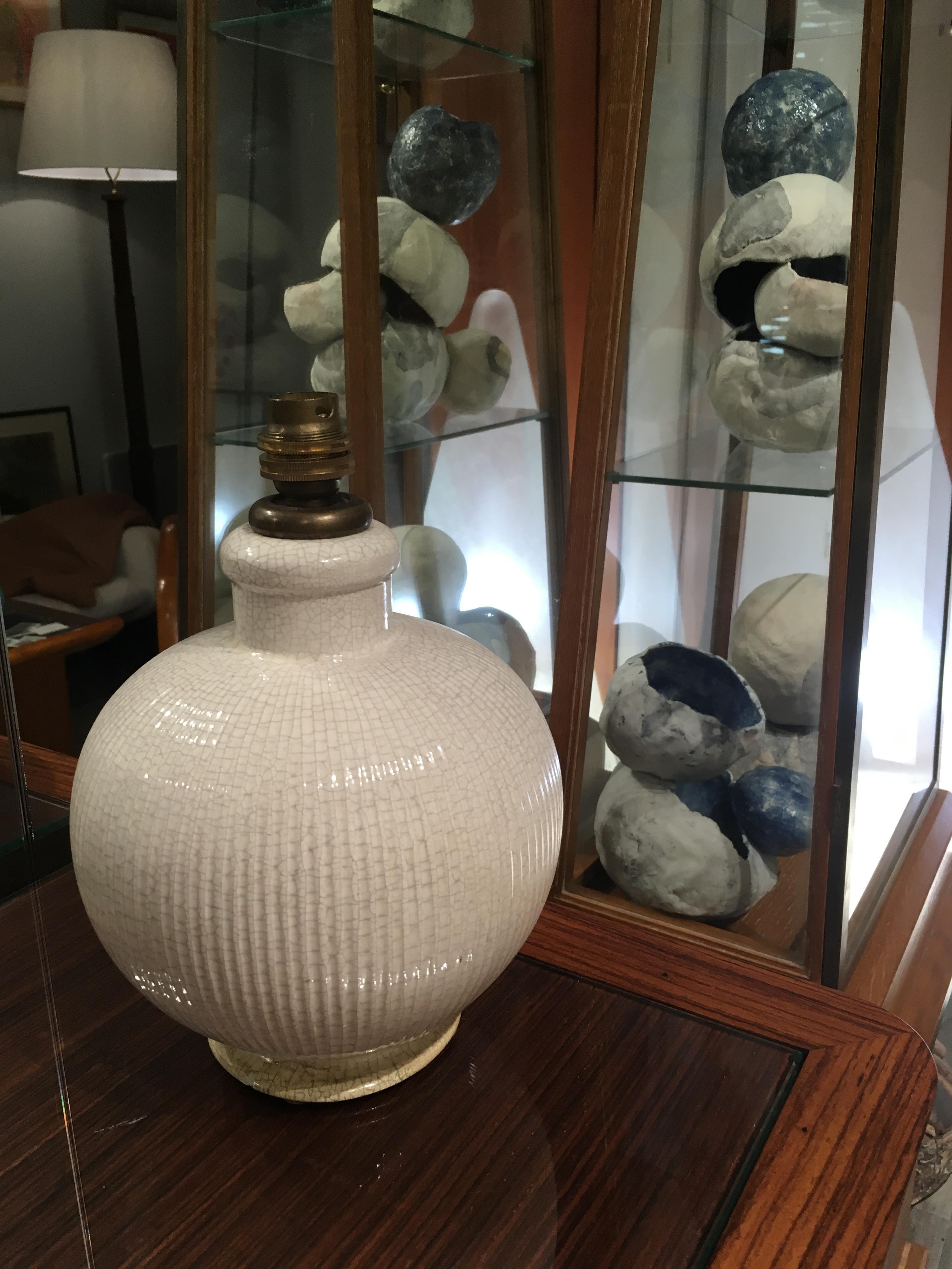 Very rare ceramic table lamp by the great and very important furniture designer of the XX century - Jacques Adnet (1900-1984)
known especially for his contribution to French modernism thanks to his pieces become legendary. The Adnet objects has the