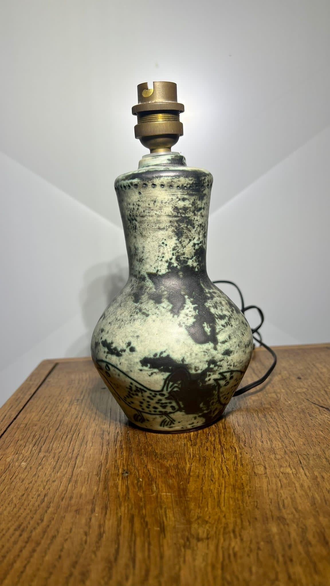 A typical table lamp signed J. Blin.