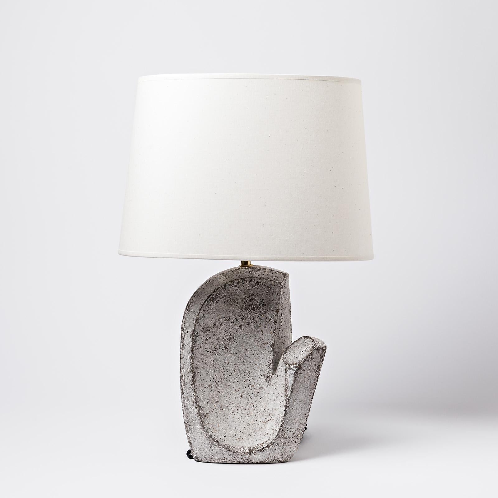 A ceramic table lamp by Maarten Stuer.
Signed under the base.
Sold with the lampshade and a new European electrical system.
2021.
Dimensions:
Dimensions with ceramic, electrical system, lampshade: 53 x 30 x 20 cm
Dimensions without ceramic,
