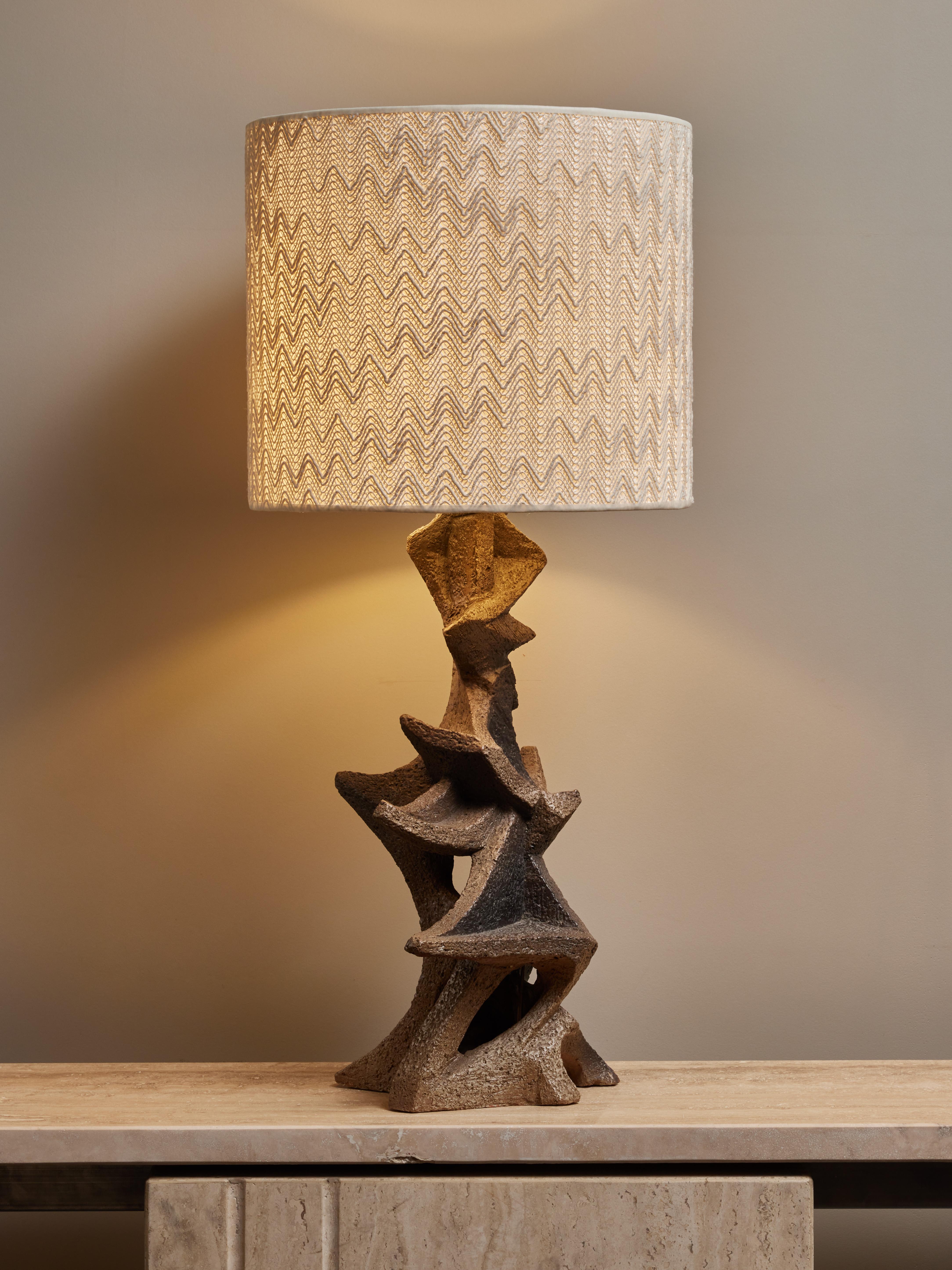 Ceramic table lamp made by the french artist Marius Bessone.

Topped with a modern shade

MARIUS BESSONE - Born in 1929
Marius Bessone was a renowned French ceramist who spent most of his life in the town of Vallauris, located in the south of