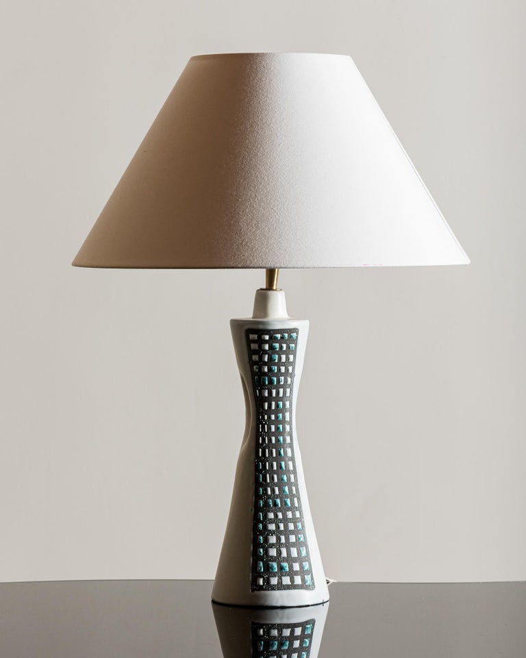 A classic Capron lamp in Pajama pattern from Vallauris, France, 1960s.

Listed dimensions are for lamp alone. Comes with a linen shade Height 9.5