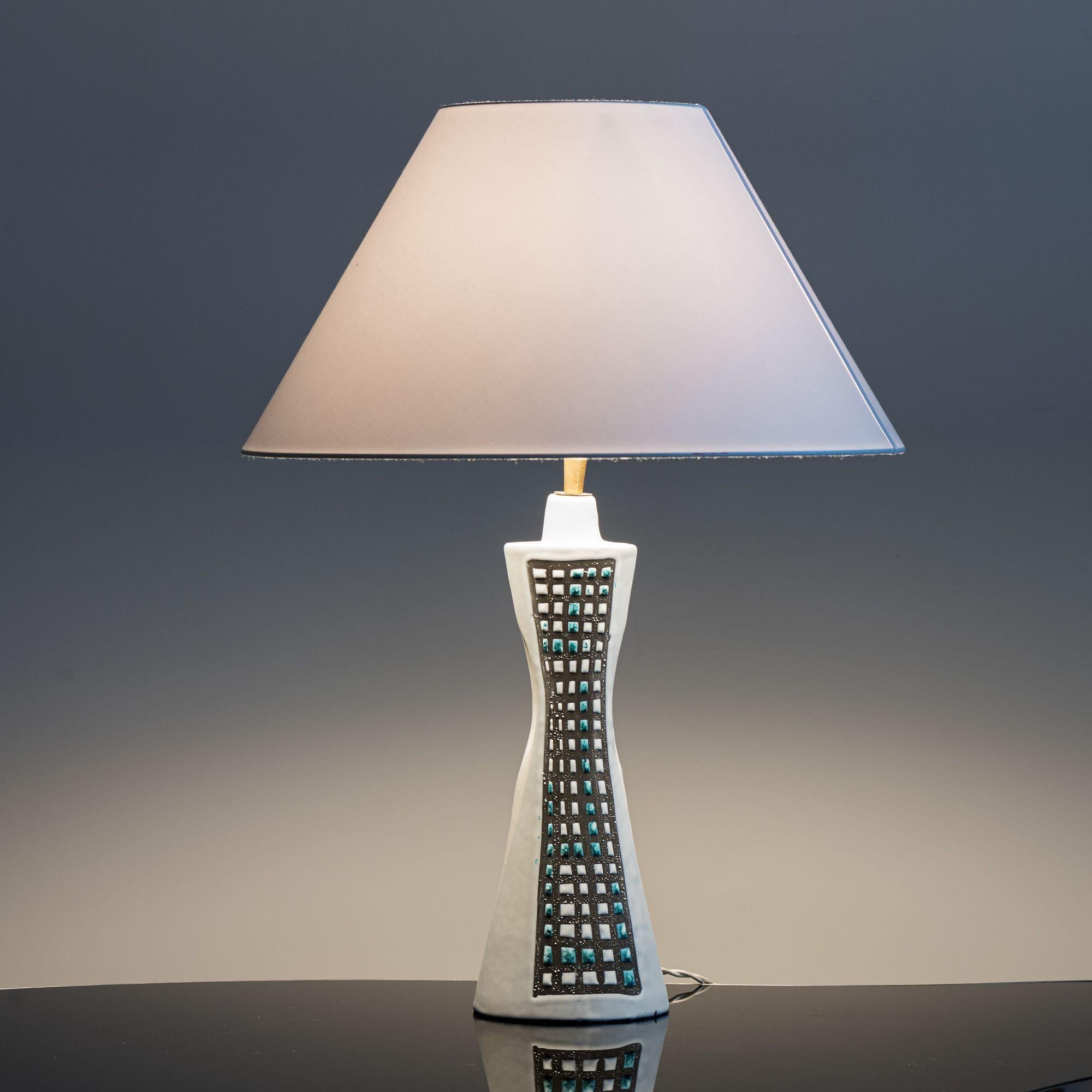 A classic Capron lamp in Pajama pattern from Vallauris, France, 1960s.

Listed dimensions are for lamp alone. Comes with a linen shade Height 9.5