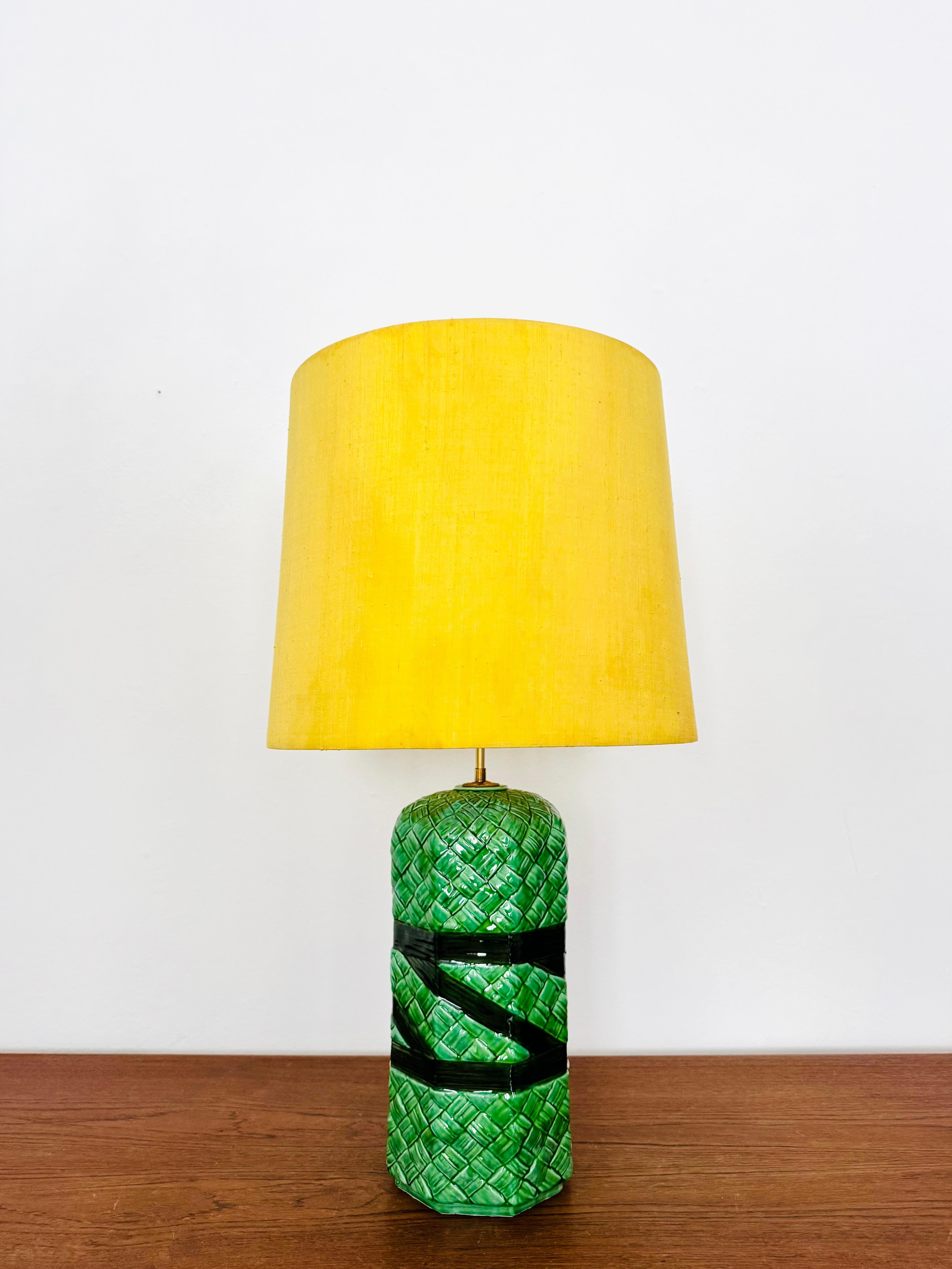 Very beautiful ceramic table lamp from the 1970s.
Wonderful design and craftsmanship.
The lamp with its hand-painted glaze is a real eye-catcher.

Condition:

Very good vintage condition with slight signs of wear consistent with age.
Slight signs of