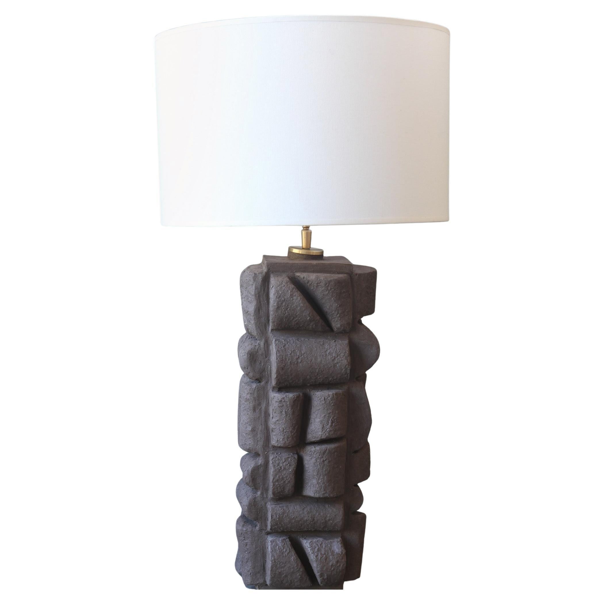 Ceramic table lamp in brown/black with a Brutalist rich surface in stock For Sale