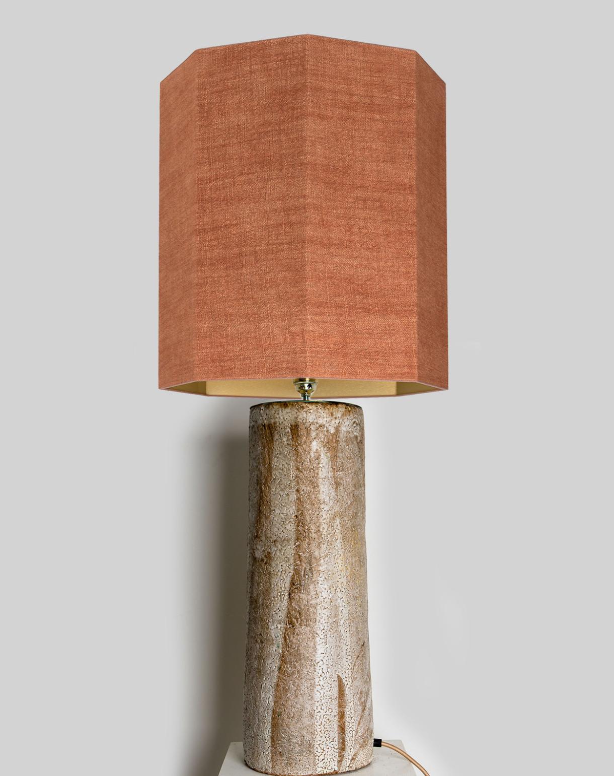 A rare large ceramic table lamp from Mid-20th Century. Sculptural piece, made of handmade ceramic elements in natural tones. With a special custom made lamp shade by René Houben. Brique color with a warm bronze inner-shade.

The lamp is in perfect