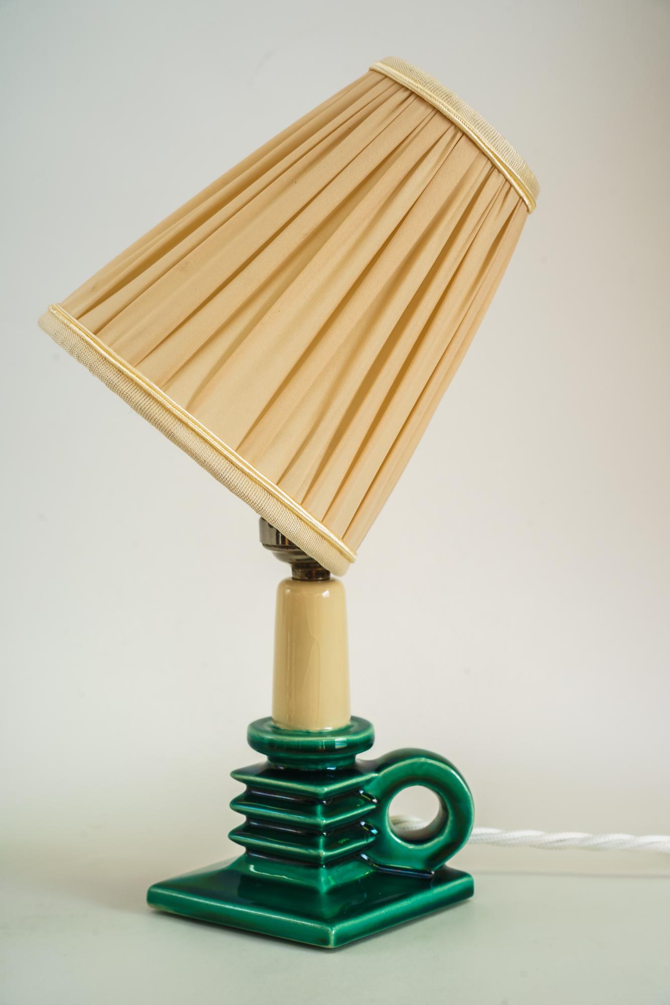 Early 20th Century Ceramic Table Lamp with Fabric Shade Around 1920s For Sale