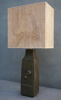 Lampada da tavolo in ceramica con paralume in paglia