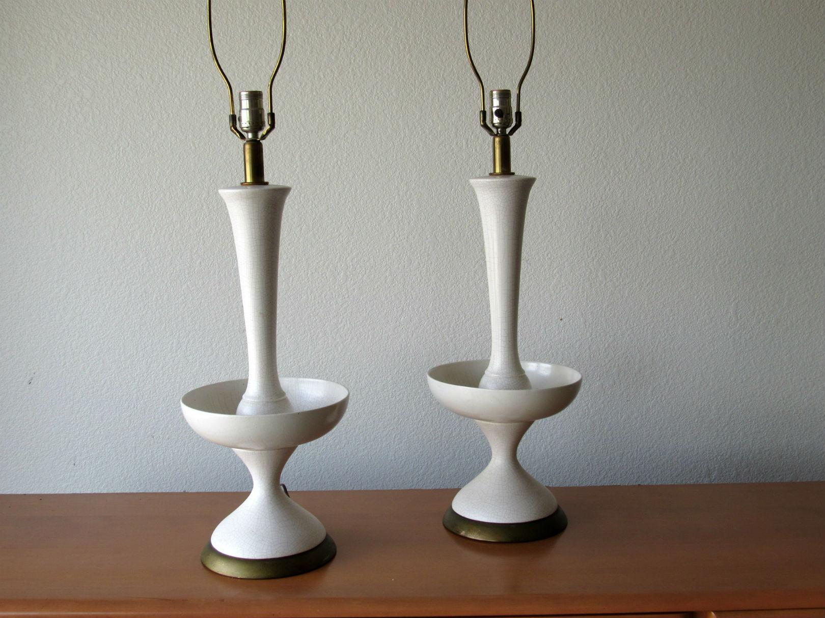 Gerald Thurston Ceramic Table Lamps for Lightolier.   Pair of elegant lamps featuring a white crackle glaze with gilded wood bases.  