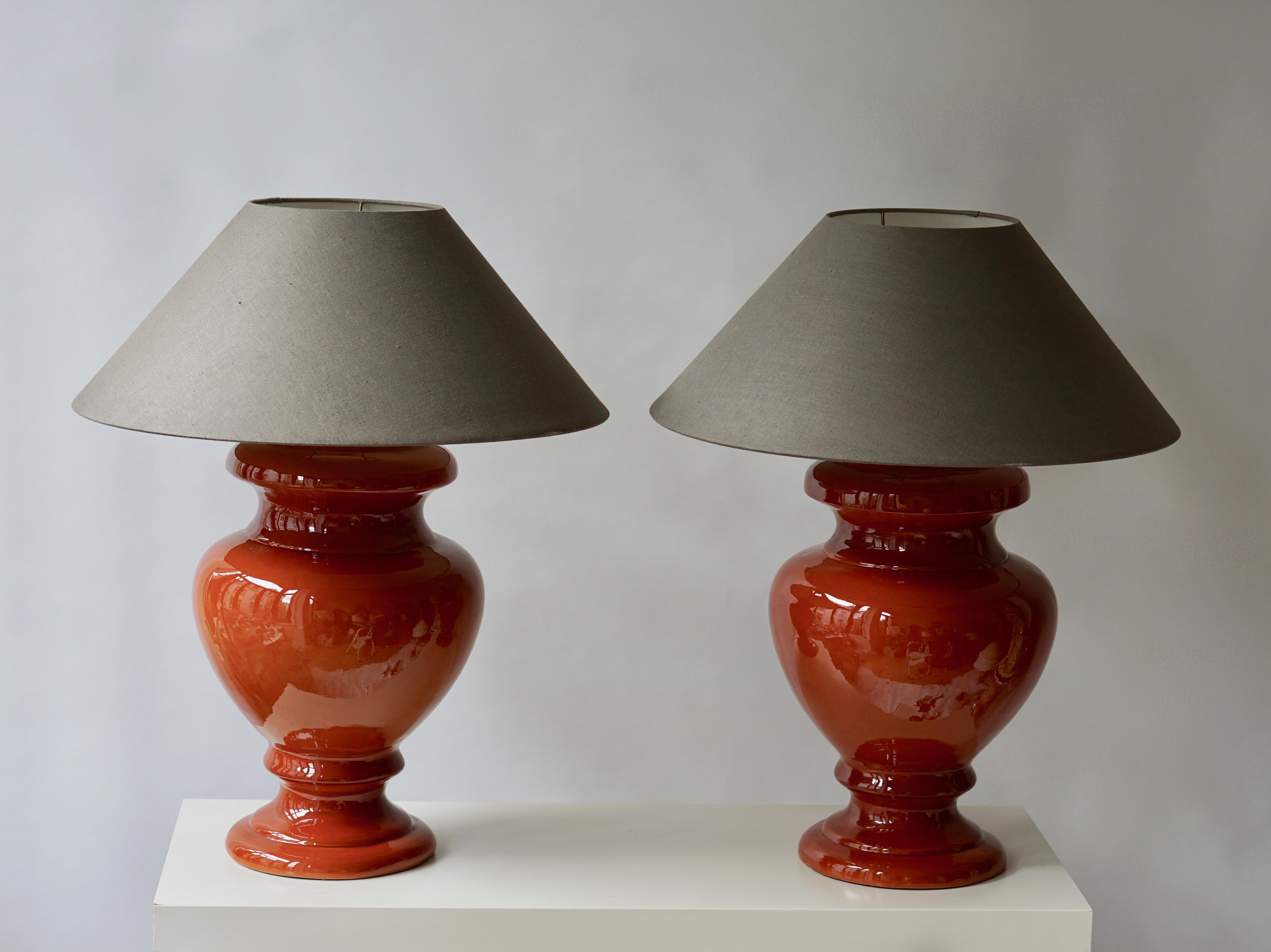 Two Italian ceramic table lamps.
Measures: 
Height with shade 70 cm.
Height base 45 cm and with the socket 54 cm.
Diameter shade 55 cm.
Diameter base 30 cm.

 
Shades shown are for demonstration purposes only.