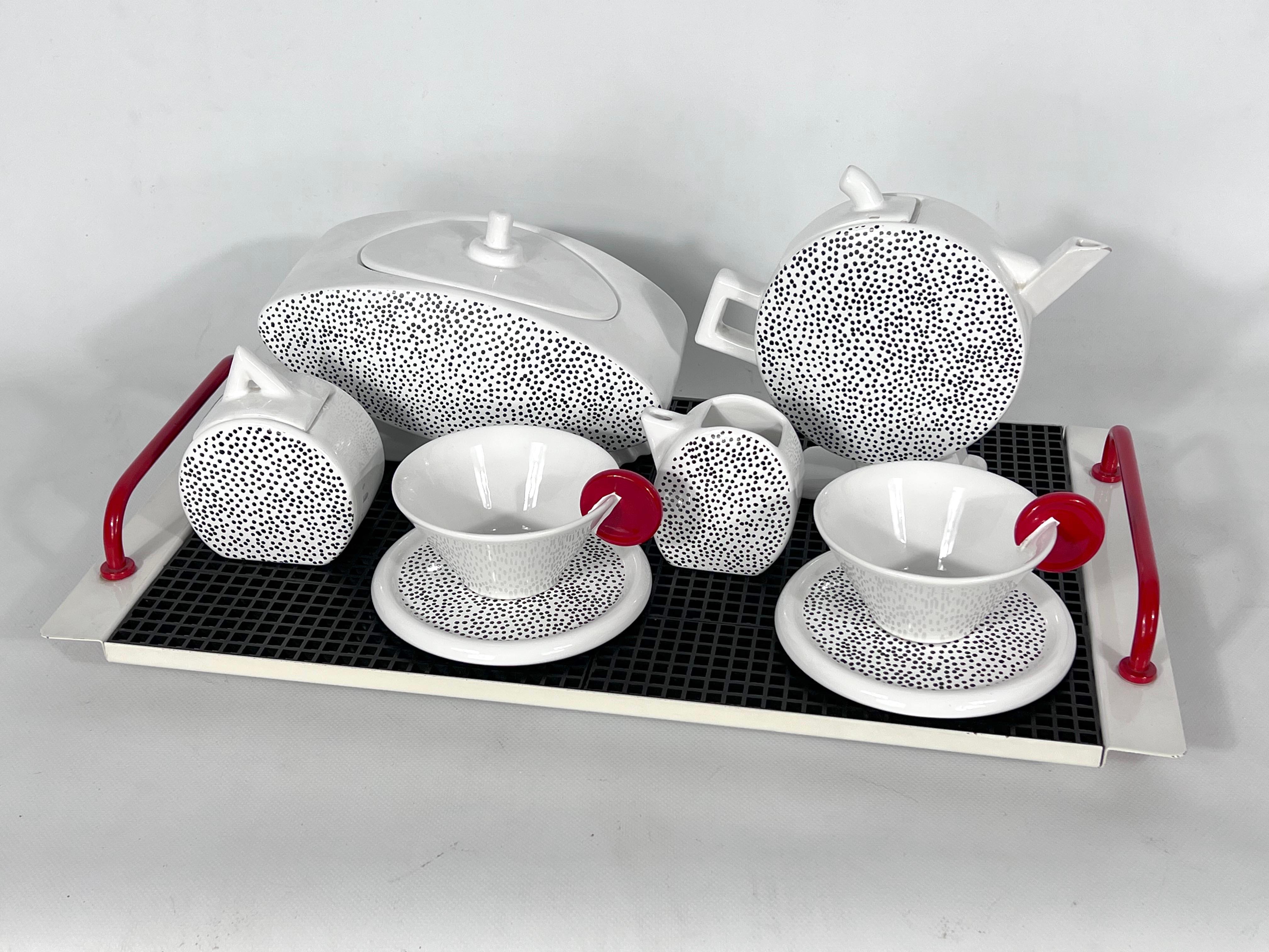Very good Vintage condition with normal trace of age and use for this white, red and black ceramic tea set with the original tray. Signed by MAS and produced in Italy during the 80s.
 