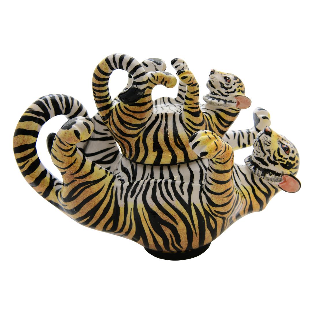 Tiger Jewelry Box: Hand-Painted by Zimhle and Sculpted by Sbusiso & Sfiso

The Tiger Jewelry Box is a captivating piece of decorative art crafted in South Africa, embodying the spirit of one of nature’s most majestic creatures. Measuring 4 inches