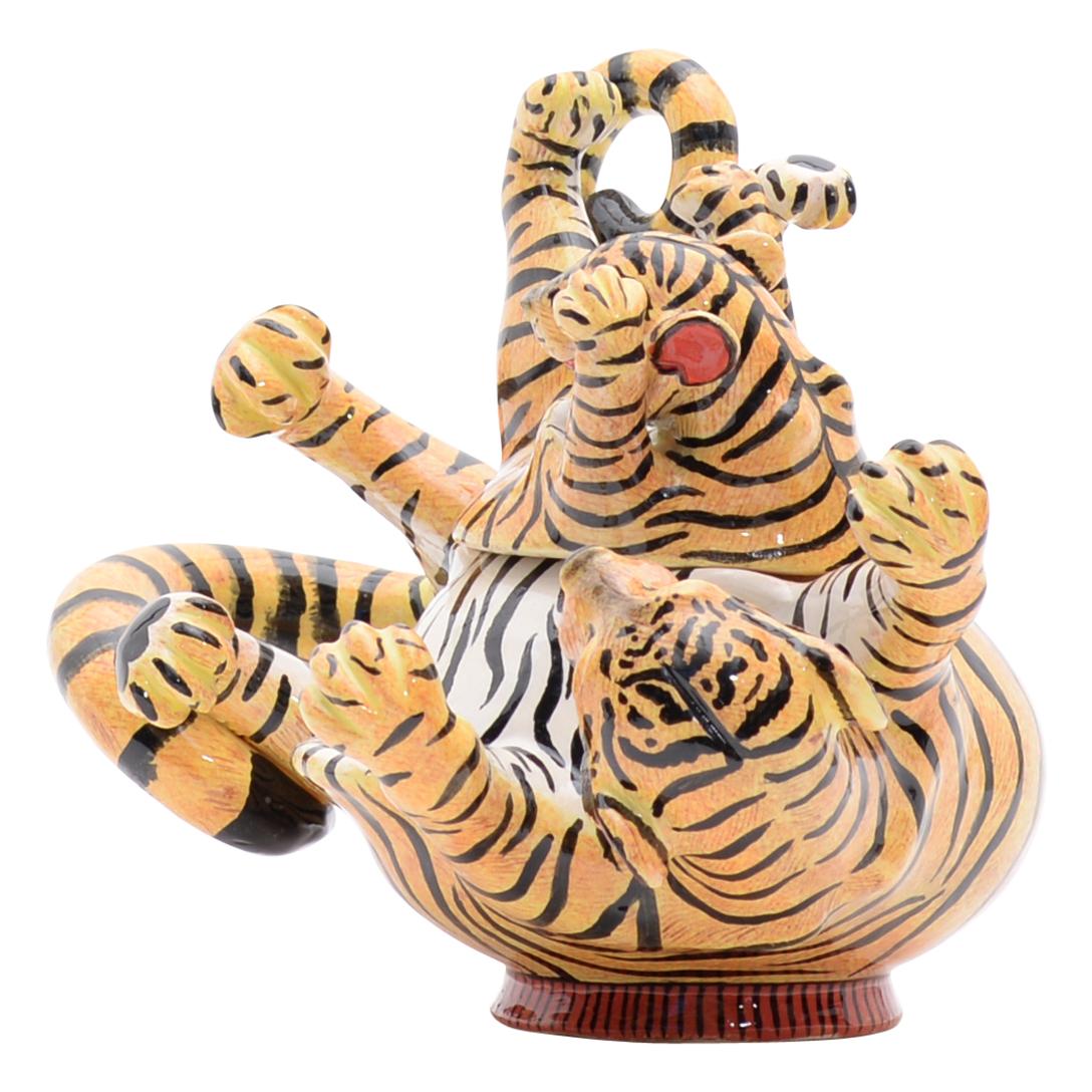 Tiger Jewelry Box: Hand-Painted by Winnie Mchunu and Sculpted by Sbusiso & Motsamayi

The Tiger Jewelry Box is a remarkable piece of ceramic art that beautifully captures the essence of one of nature's most revered animals. Crafted by Love Art