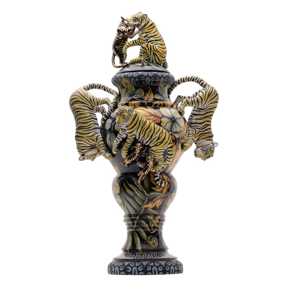The ceramic Tiger urn from Senzo Duma Ceramics is a masterpiece of African artistry, standing 32 inches tall with dimensions of 18 inches in length and width. Hand-painted by Mlungisi Vilakazi and hand-sculpted by Thabo Mbhele, it embodies the rich