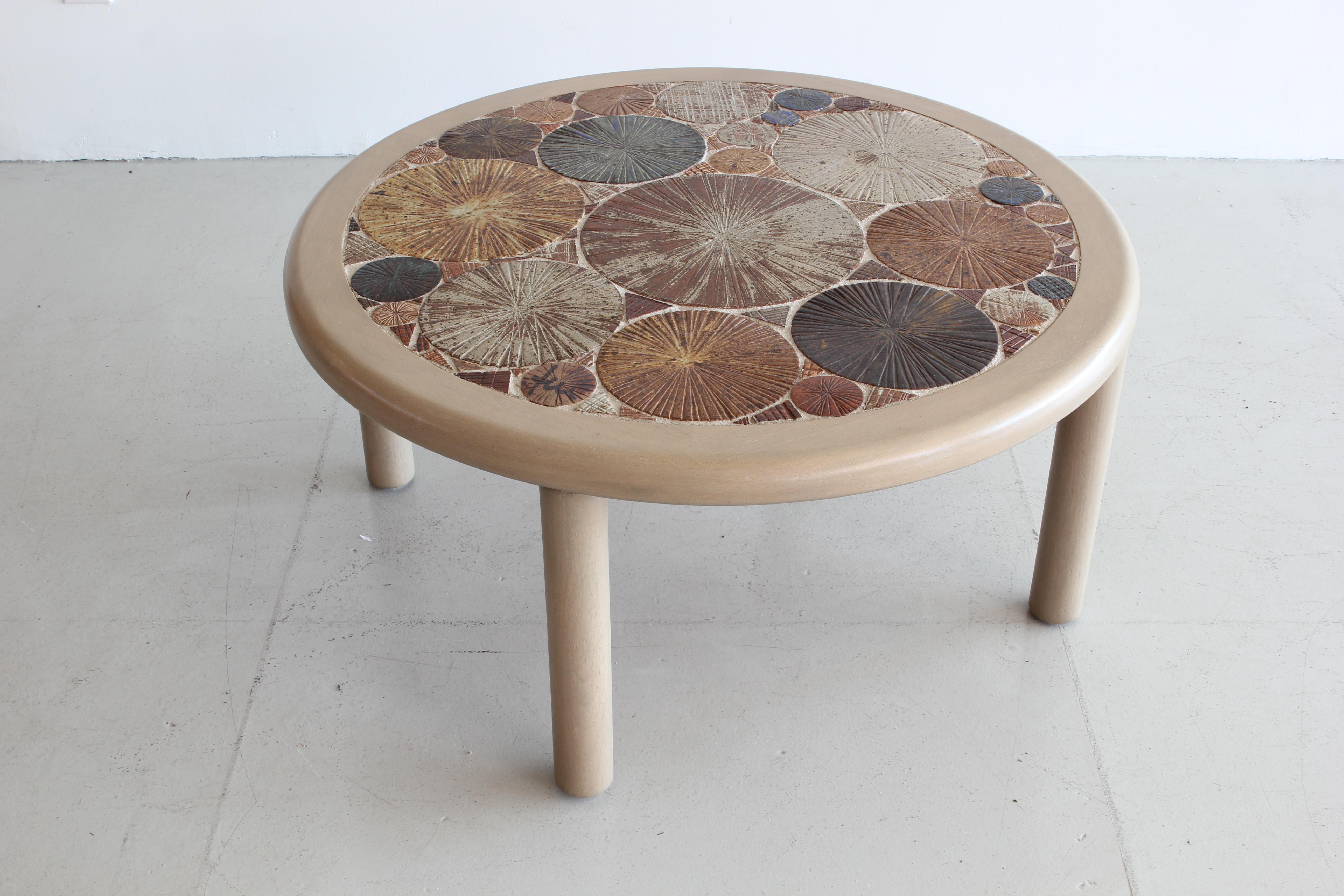 Gorgeous ceramic tile coffee table by Tue Poulsen for Haslev Danish Modern. 

Wonderful color and texture to the tile work and table is hand signed. 

Rare to find in USA.