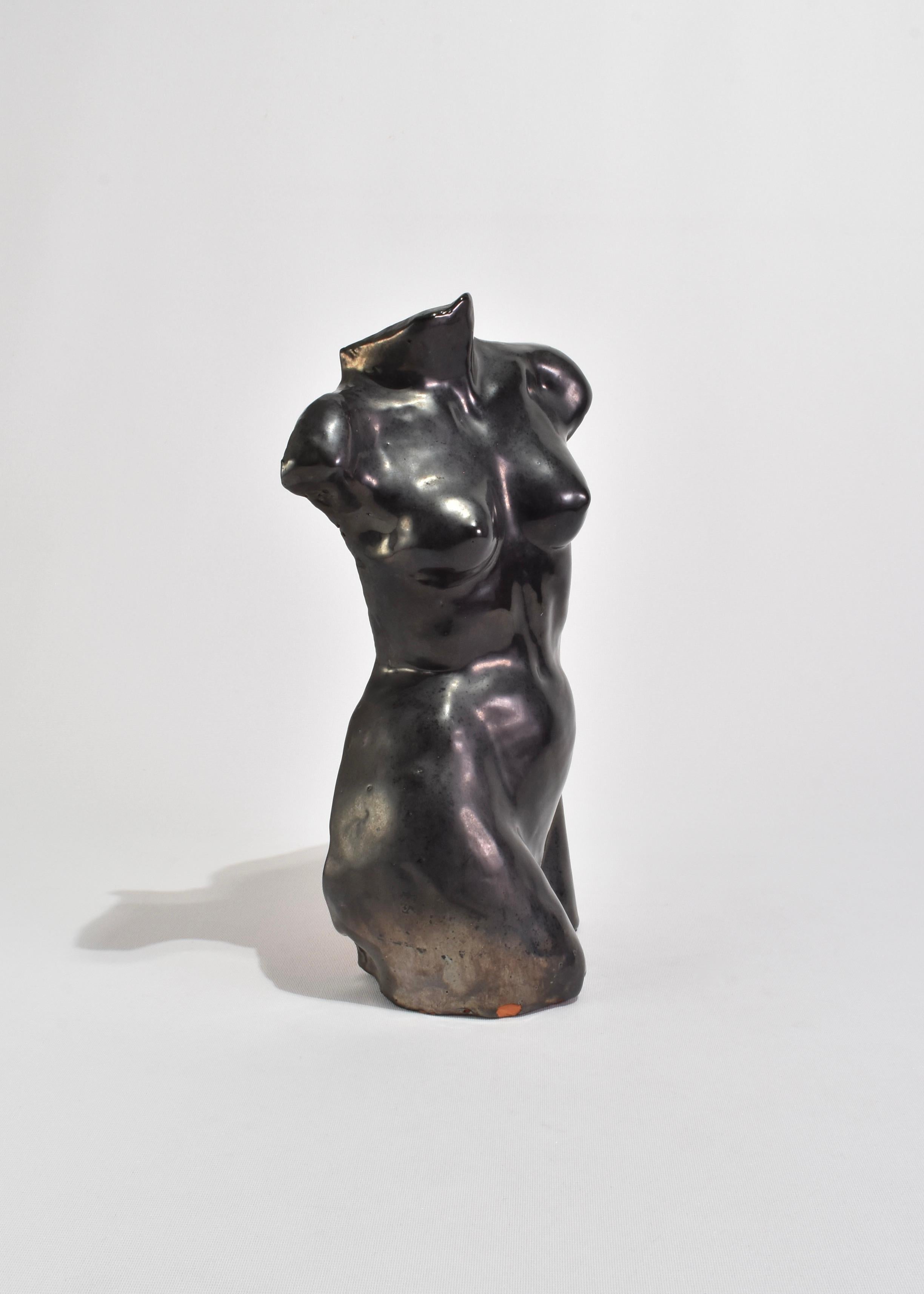 Stunning vintage handmade terracotta torso sculpture in a glossy charcoal glaze, signed on interior.