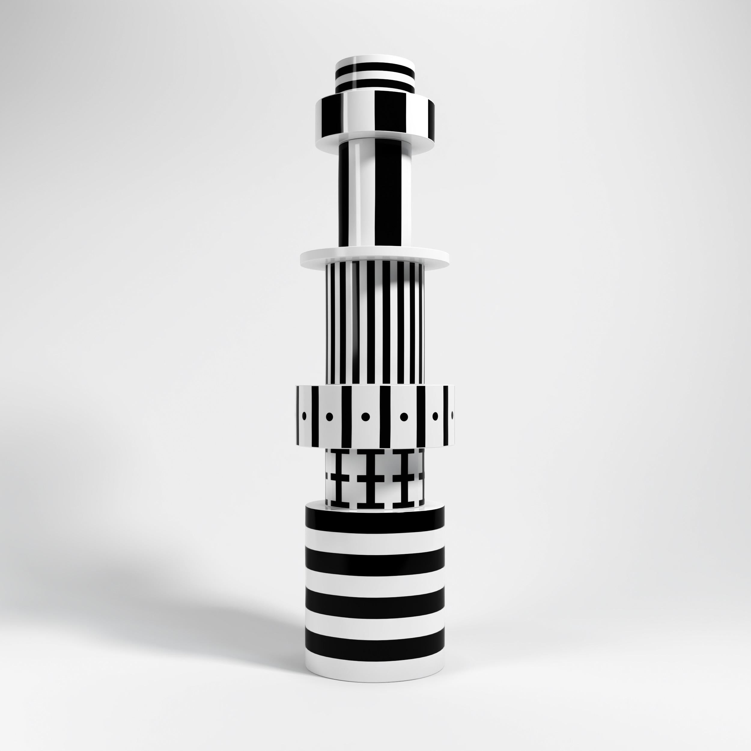 Ceramic sculpture of the Totem collection designed by Alessandro Guerriero and produced by Superego Editions. Prototype. Signed.

Biography
In 1976 Alessandro and Adriana Guerriero established Alchimia, the first example of manufacturing designers