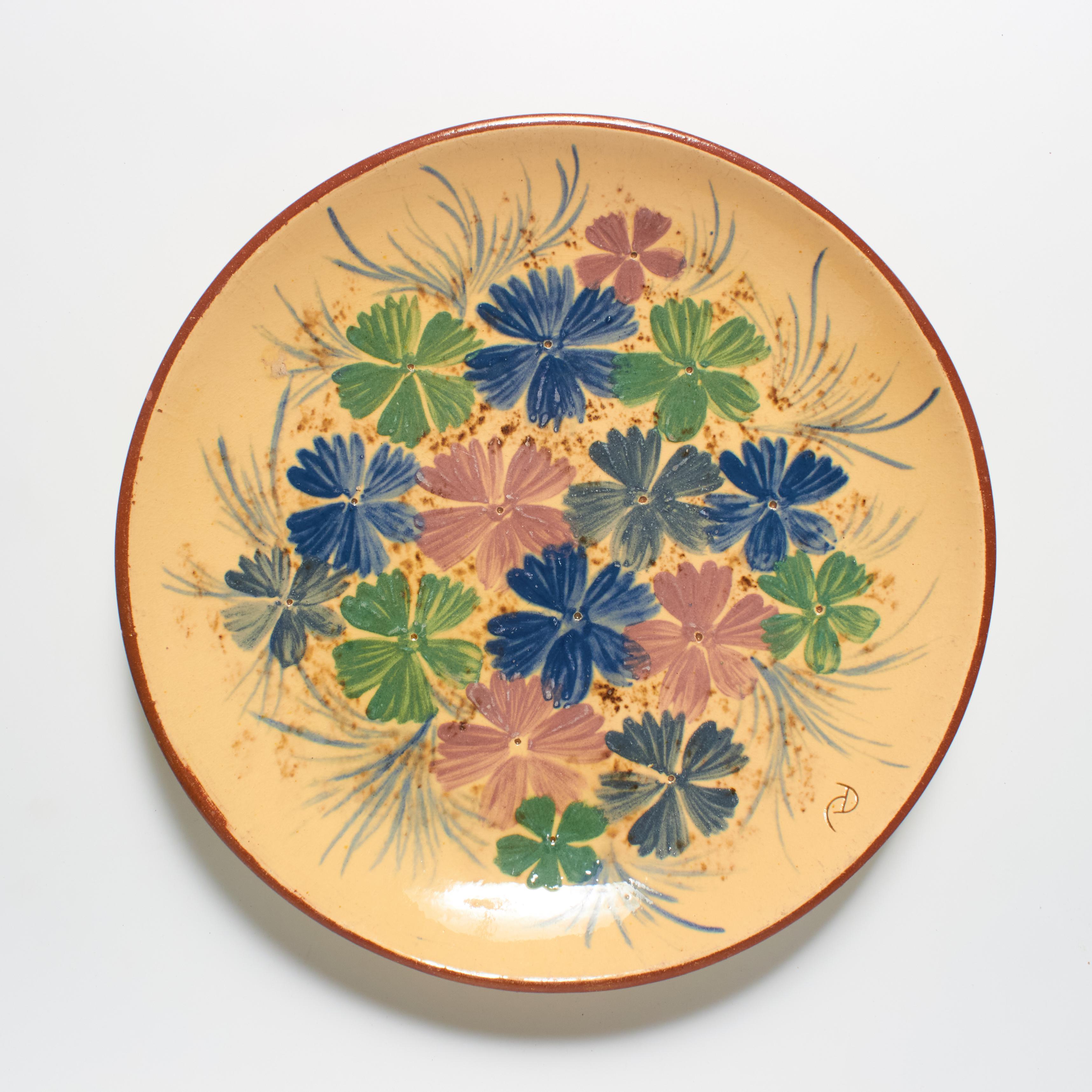 Immerse yourself in the artistic legacy of Catalan artist Diaz Costa with our vintage hand-painted ceramic plate artwork, circa 1960. This exquisite piece captures the essence of mid-century design, showcasing Diaz Costa's craftsmanship and unique