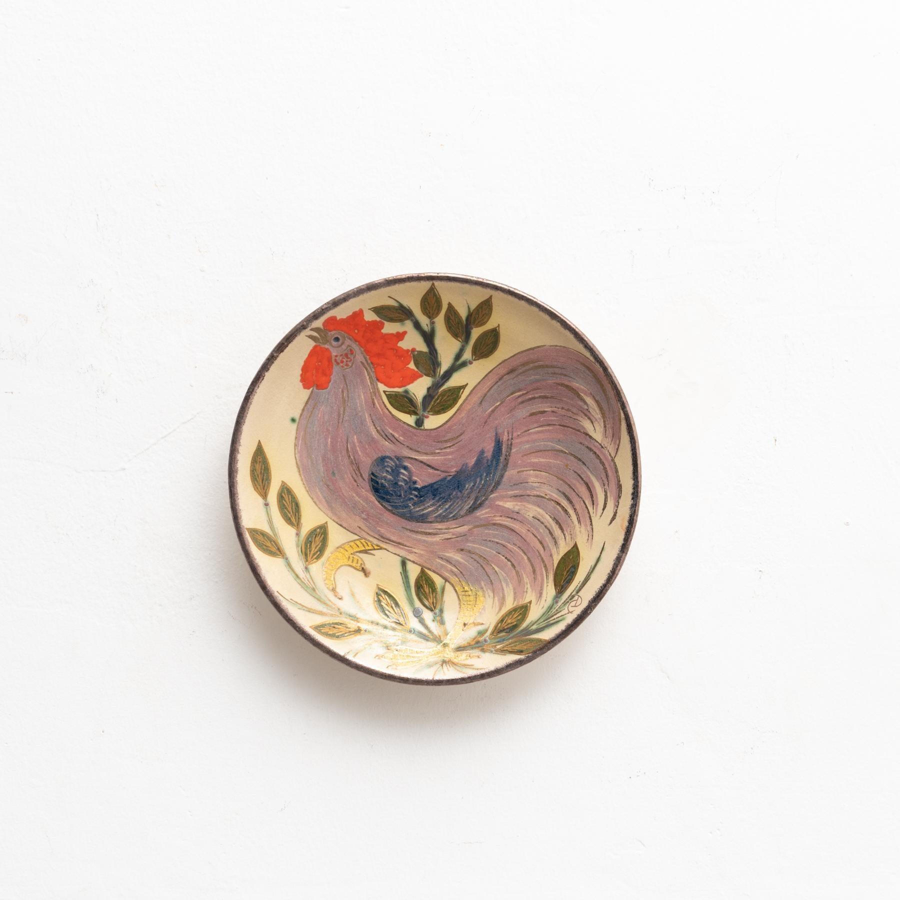 Ceramic hand painted plate artwork.    Manufactured by Catalan artist Diaz Costa, circa 1960.    In original condition, with minor wear consistent of age and use, preserving a beautiful patina.    Signed in the back.    Materials:  Ceramic.