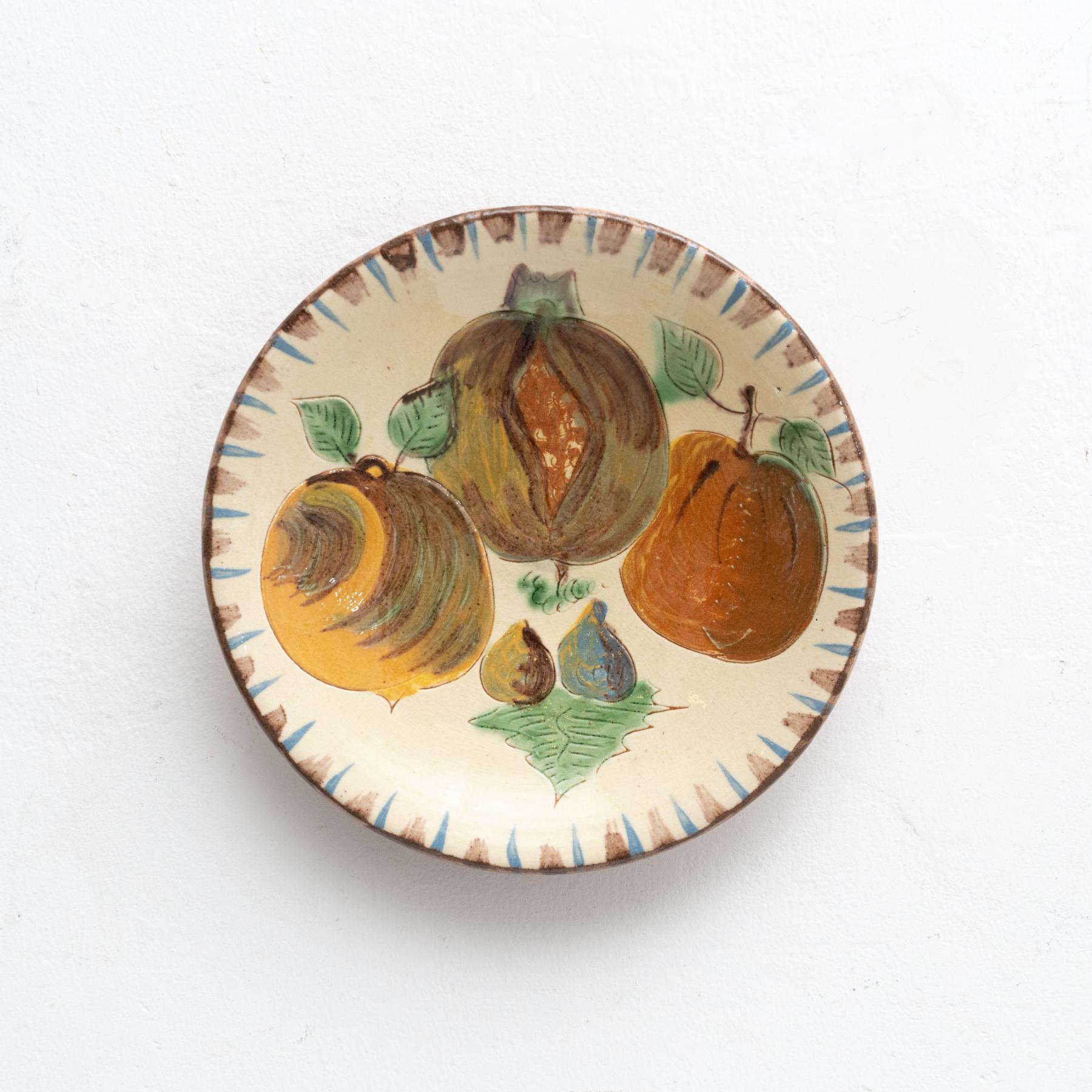 Ceramic decorative hand painted plate artwork.

Manufactured by Catalan artist Puigdemont, circa 1960.

In original condition, with minor wear consistent of age and use, preserving a beautiful patina.

Signed in the