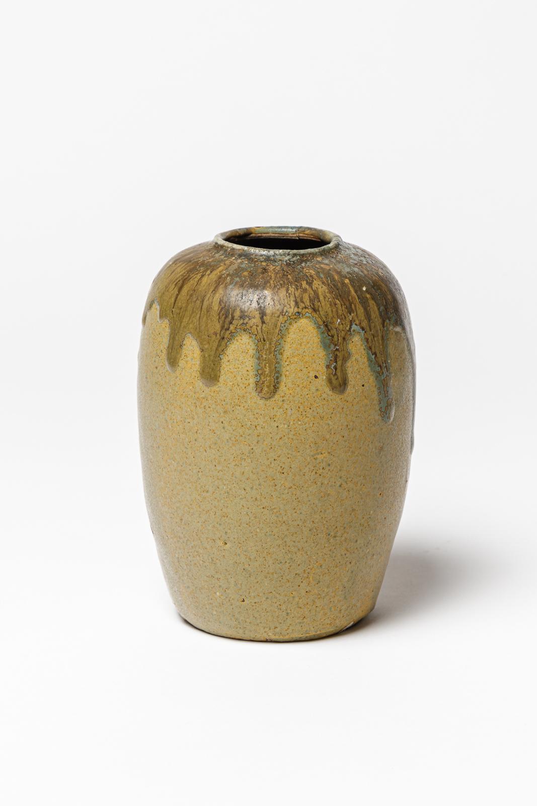 Green and yellow glazed ceramic vase by Eugene Lion.
Unsigned. Circa 1920.
H : 6.7 x 4.3 inches.