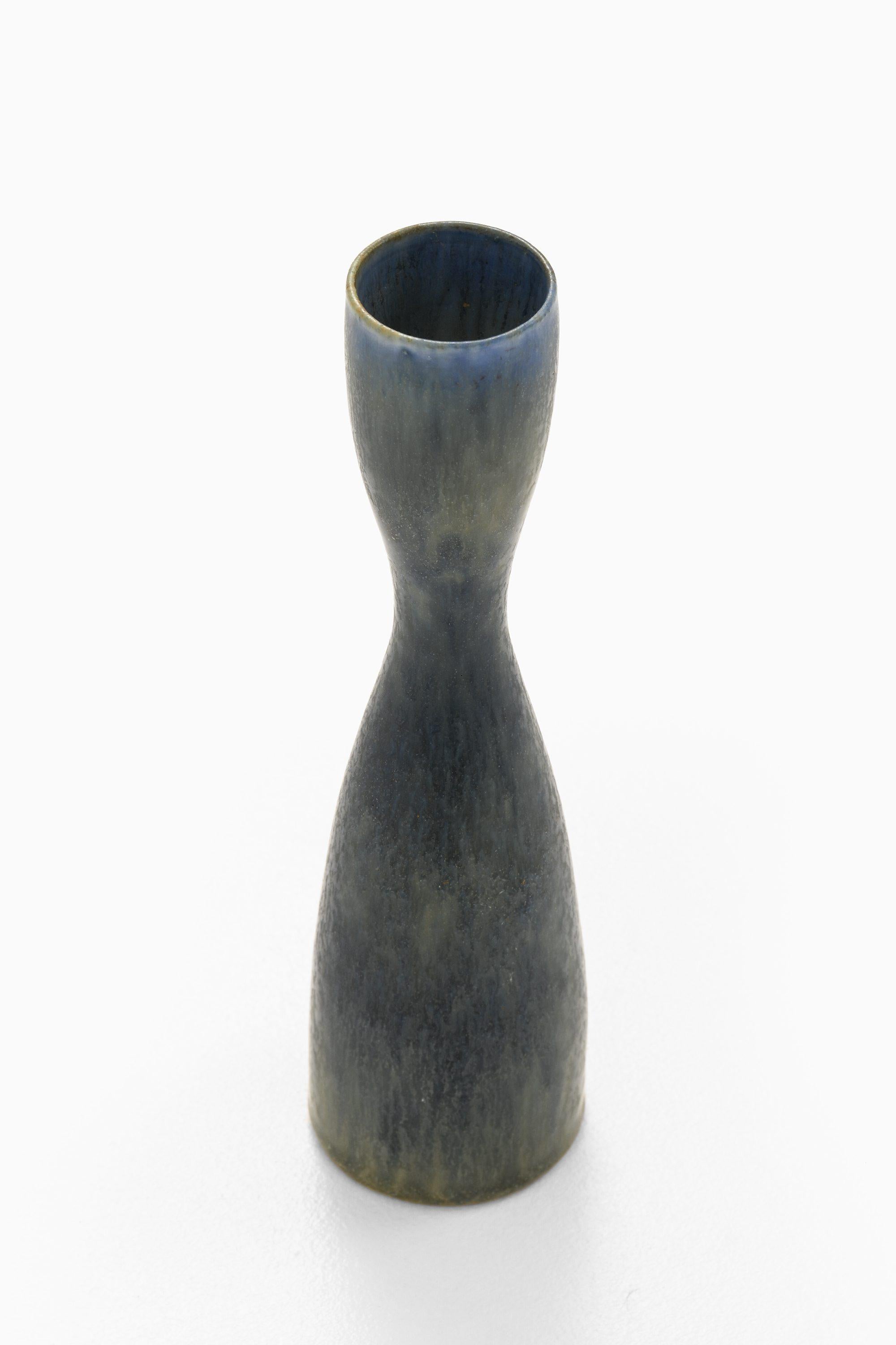 Ceramic Vase by Carl-Harry Stålhane, 1960's

Additional Information:
Material: Ceramic
Style: Mid century, Scandinavian
Produced by Rörstrand in Sweden
Dimensions (W x D x H): 5.5 x 5.5 x 20.5 cm
Condition: Good vintage condition, with signs of usage
