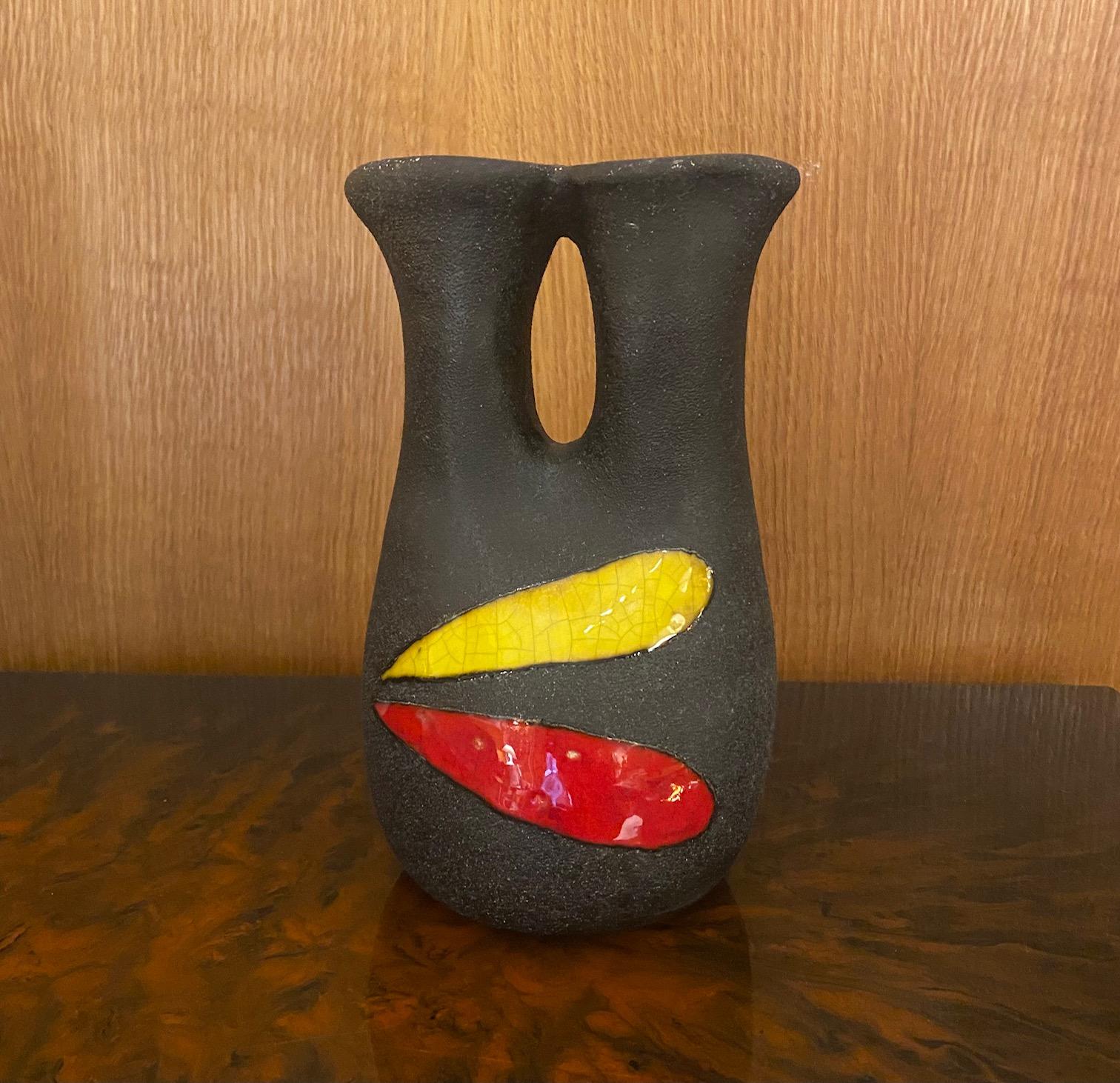 Ceramic vase by Les Archanges/Gilbert Valentin, Vallauris, France, 1950s.
Les Archanges was the name of the workshop created by Gilbert Valentin and his wife Lilette in Vallauris, south of France, in 1950. The name was given by Jean Cocteau, a