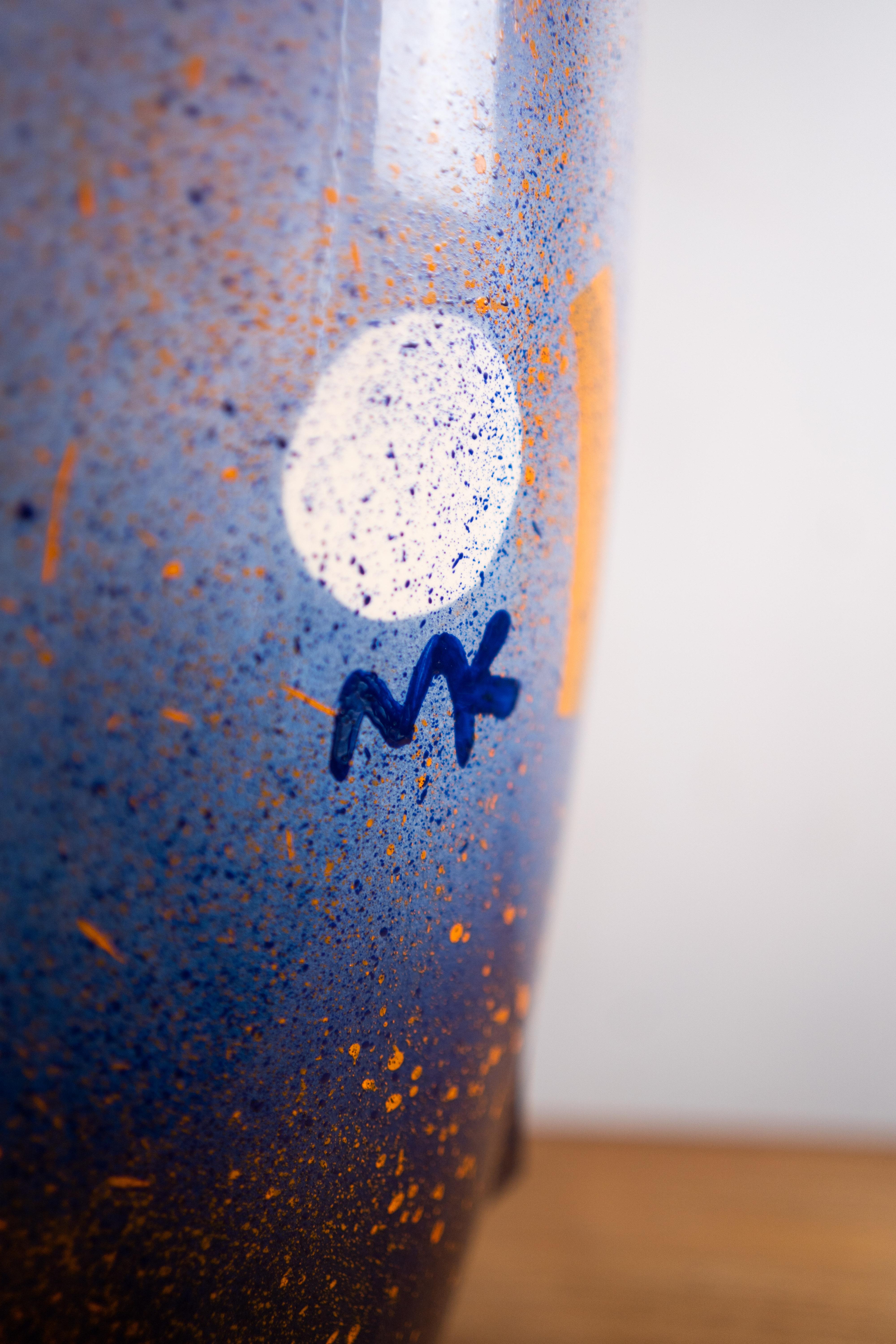 Ceramic vase by Malwina Konopacka, polish designer.
Blue and yellow vase with a effect of confetti
handmade.
