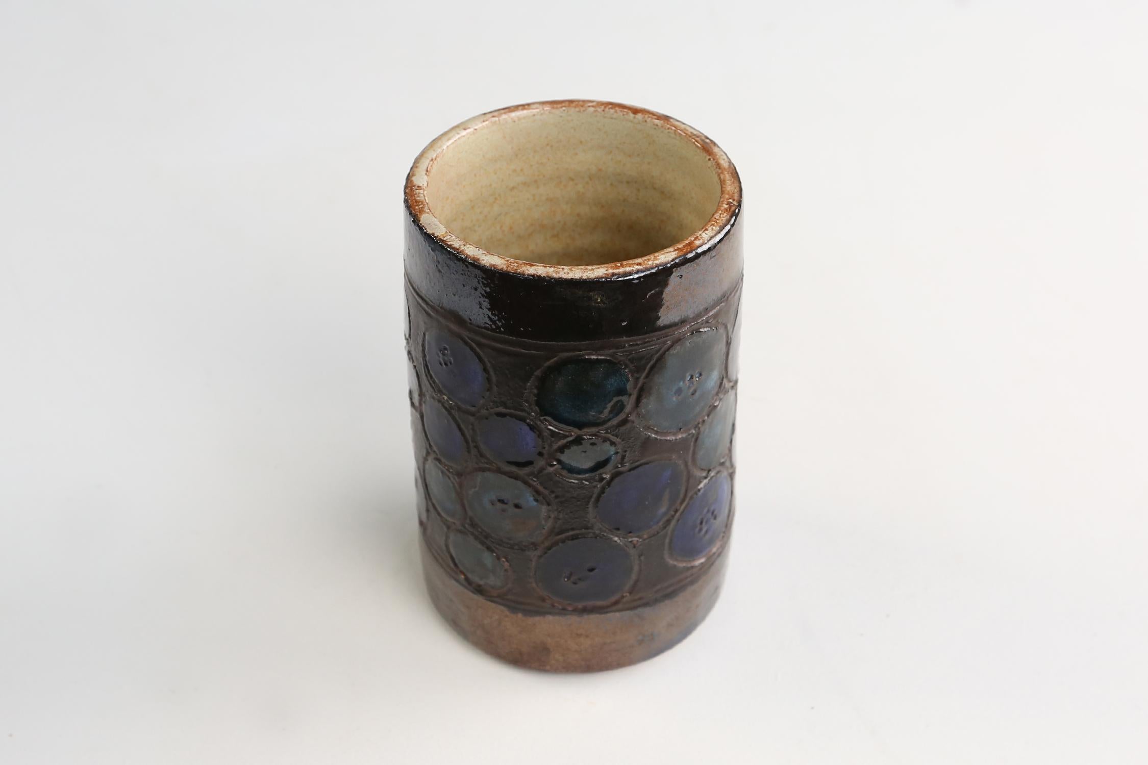 Ceramic vase made in the 1960's by Belgian ceramist Perignem.
Has some nice blue colors.