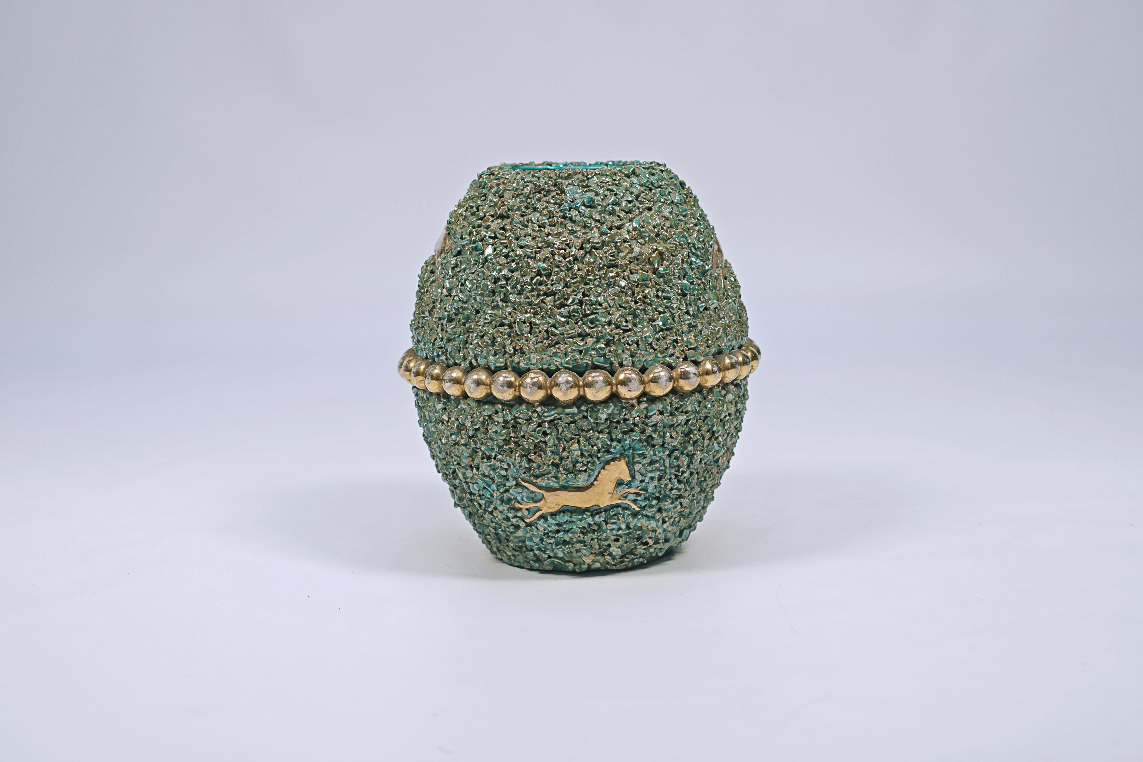 Ceramic vase by Perugiia Gabriele Bicchioni. Decoration with golden horses and balls.

Italy, CIRCA 1940.