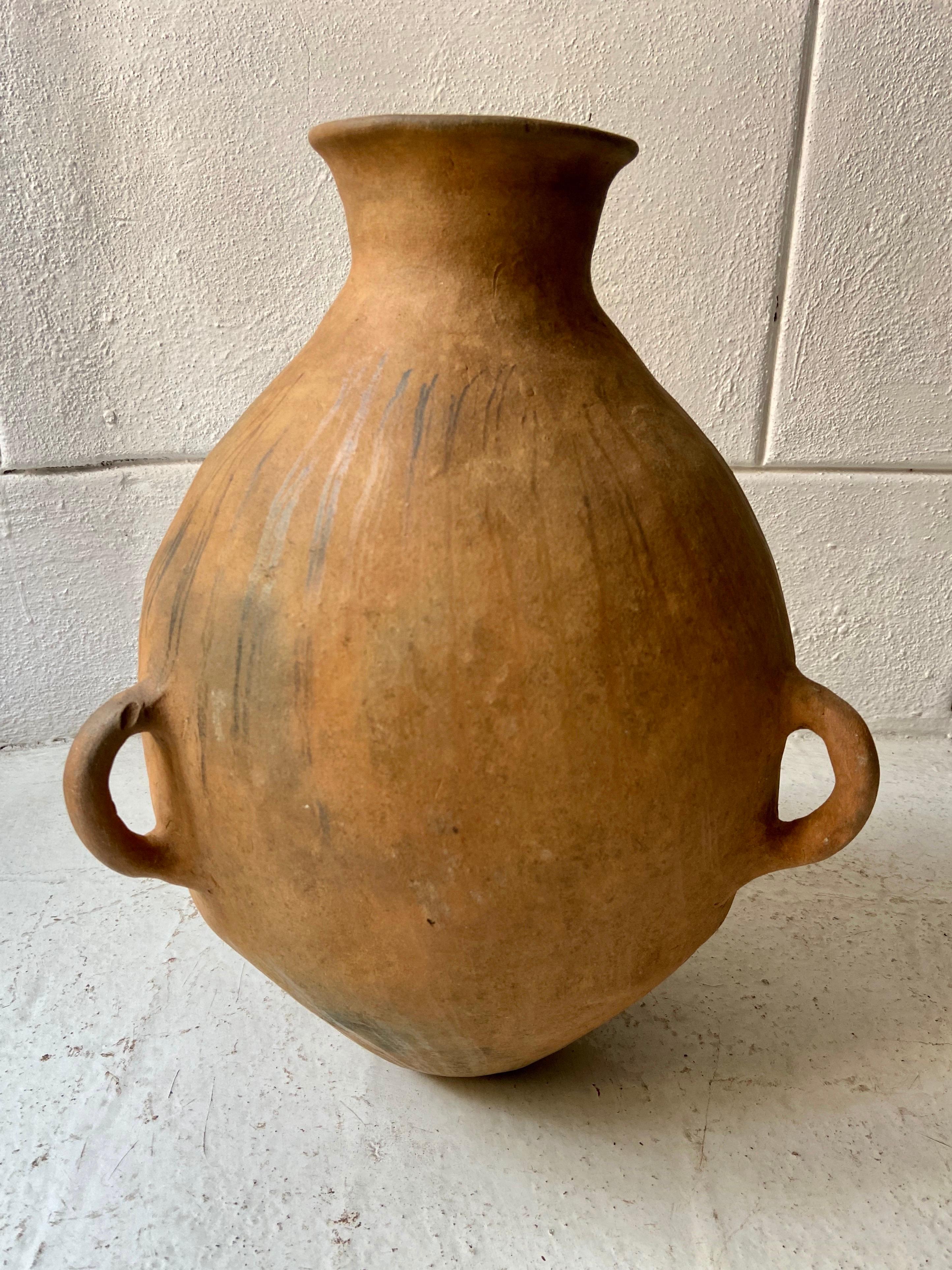 Terracotta three-rung, cone formed water vessel from the Tonalixco municipality in Puebla, Mexico, circa 1950s. Pottery as an art form and a functional tool in this region is nearly extinct.