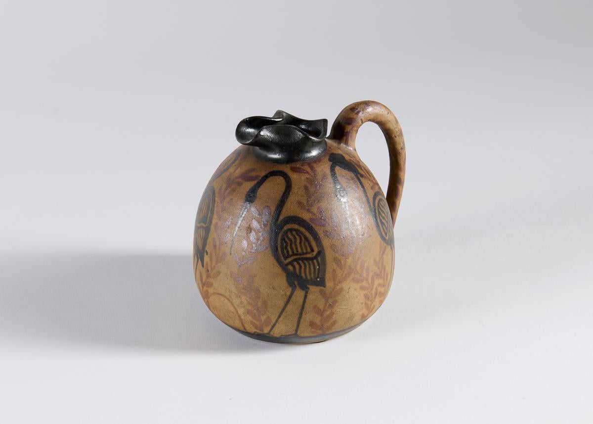 One of a set of beautiful ceramics from Ciboure Pottery, this vase is inspired by antiquity—evident in its form, its spare coloring, and its stylized depiction of animals.