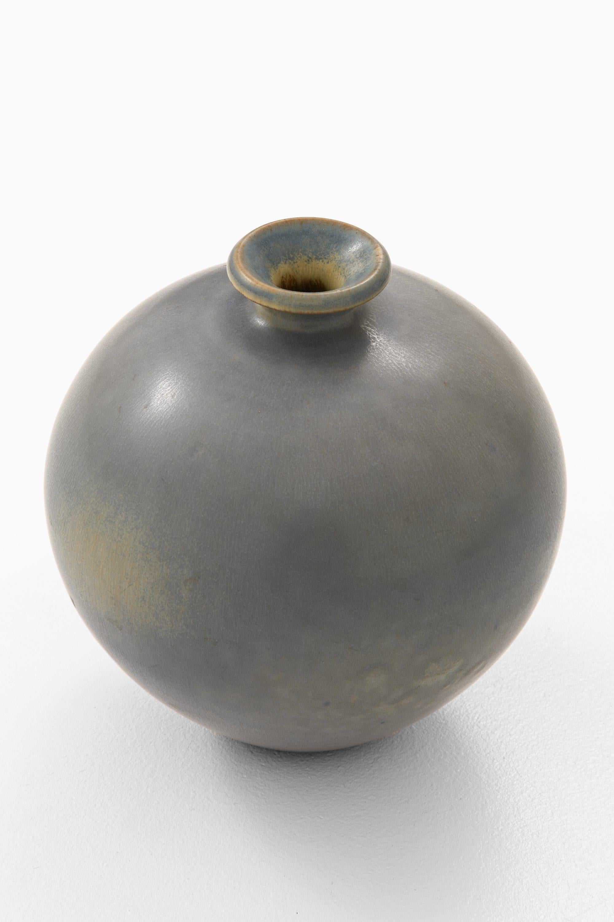 Ceramic Vase in Hare Fur Glaze by Berndt Friberg, 1960

Additional Information:
Material: Ceramic, Hare fur glaze
Style: Mid century, Scandinavia
Produced by Gustavsberg in Sweden
Dimensions (W x D x H): 16 x 16 x 17 cm
Condition: Good vintage