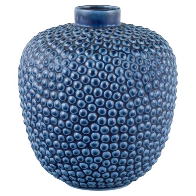 Ceramic vase in modernist design with blue glaze. Ca 1970s.