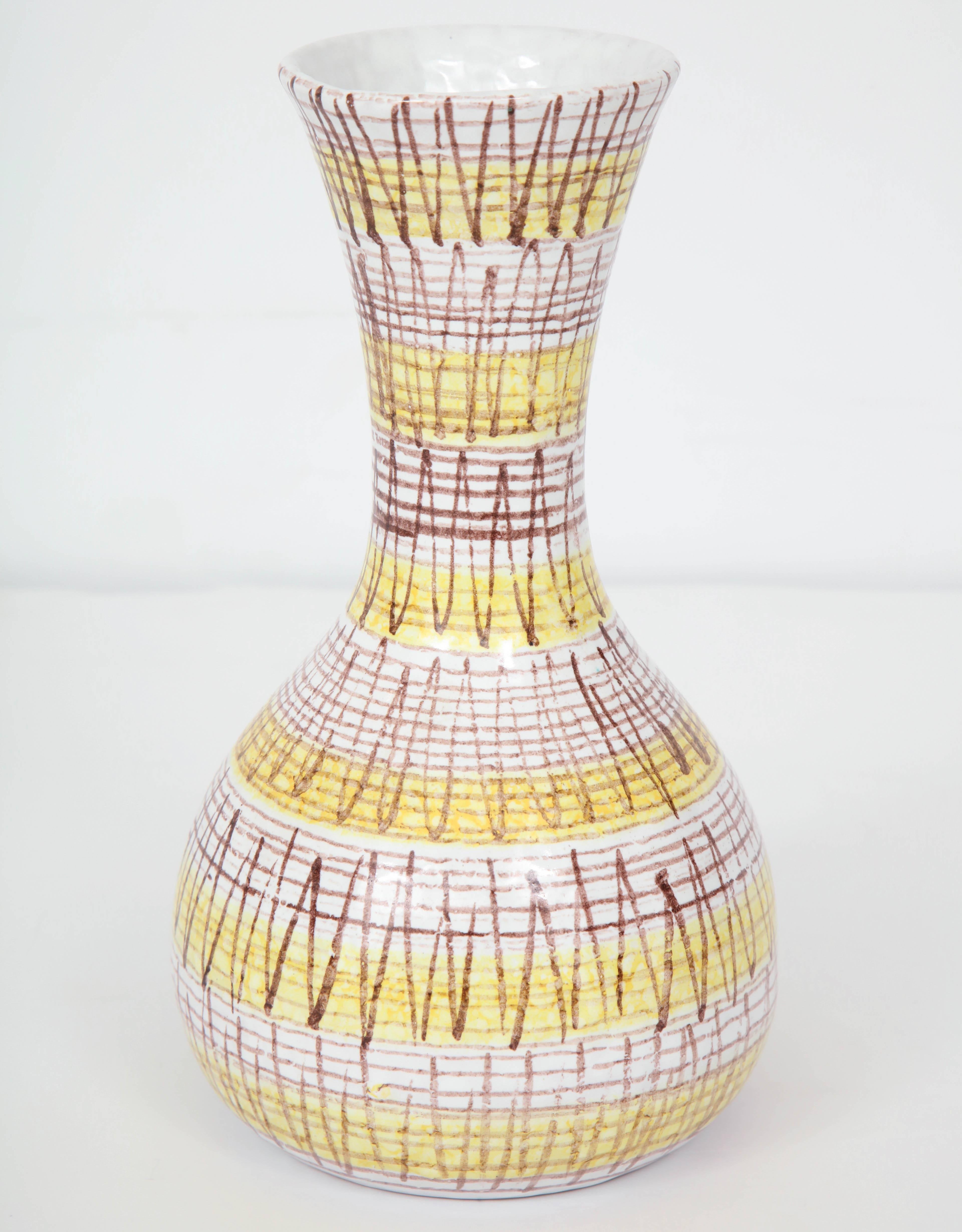 Decorative yellow and brown striped vase, circa 1950, Italy.