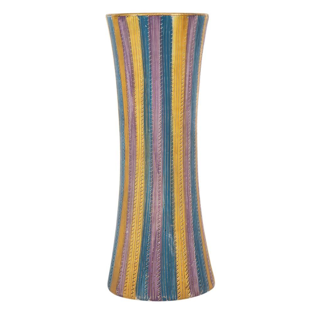 Elbee vase, ceramic stripes, pastel and gold, signed. Tall hourglass form vase decorated with pastel colored vertical stripes and subtle incised hatching pattern. Signed Elbee 30/145 Italy on underside.