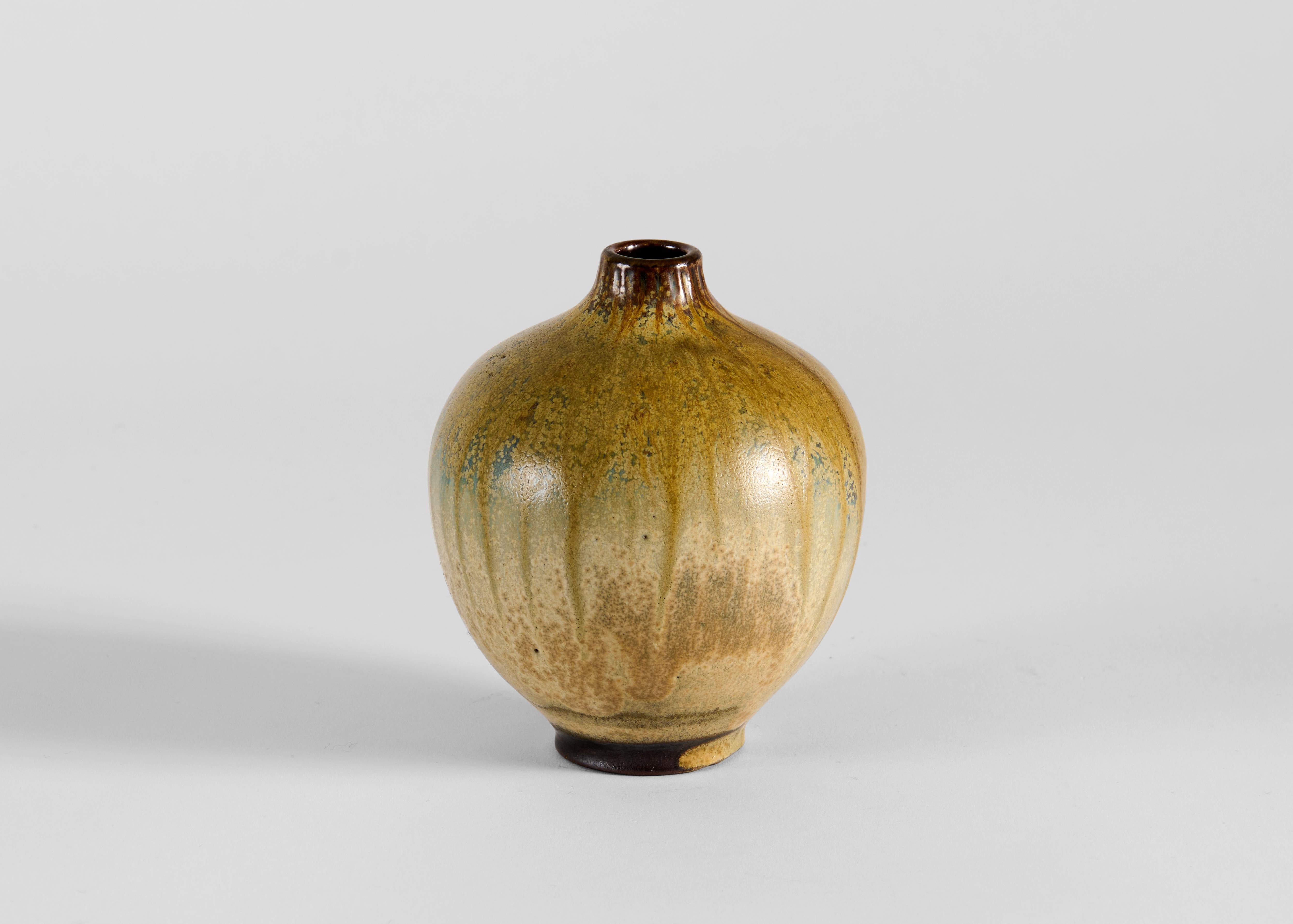 Glazed ceramic vase from Wallåkra, founded in 1864. Inscribed.