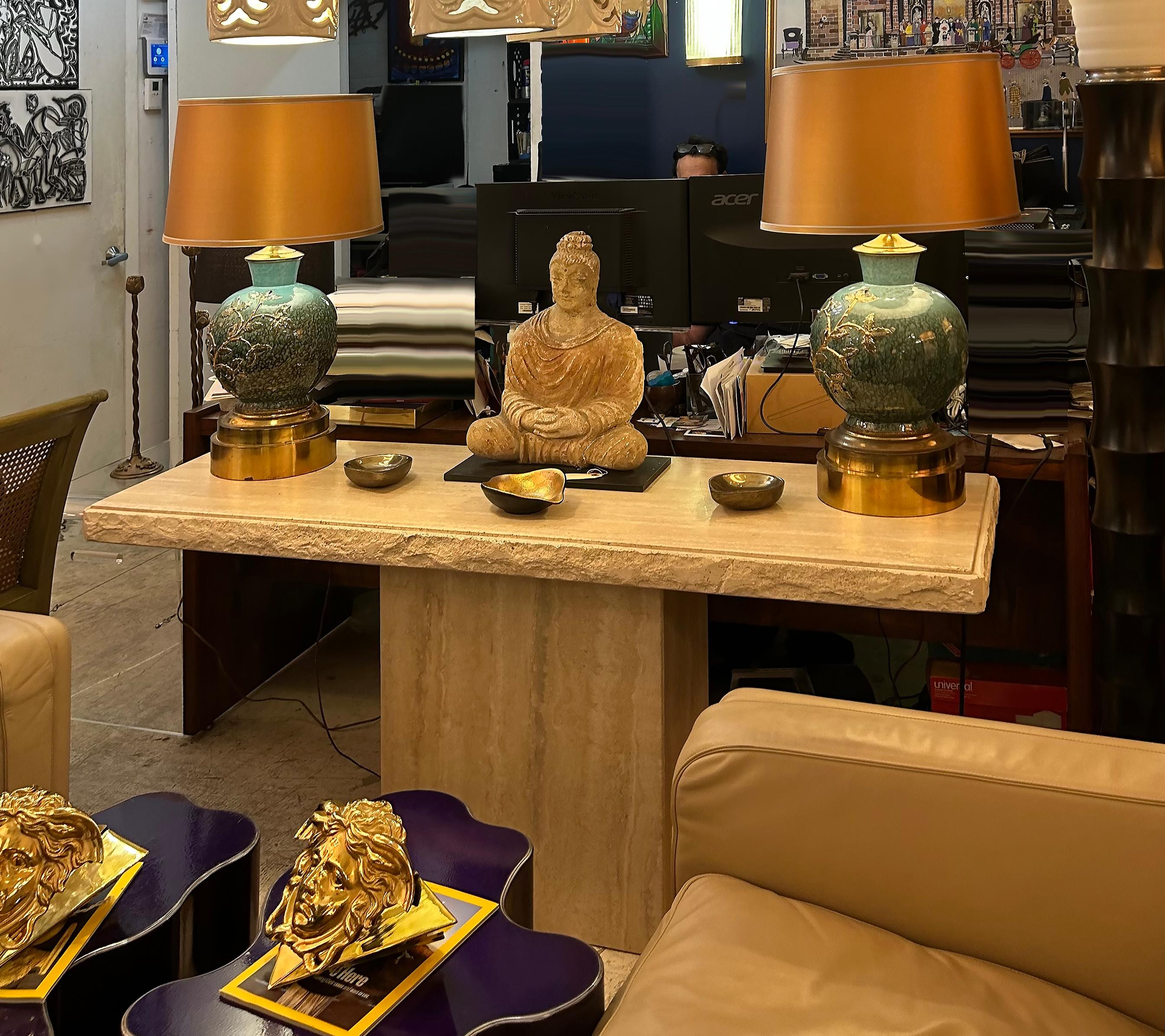 Ceramic Vases Mounted on Brass as Table Lamps,  Custom Shades,  Pair

Offered for sale is a pair of fine ceramic vases with brass bases mounted as table lamps. The pair has raised floral designs that are gilt glazed. This lovely pair of lamps is