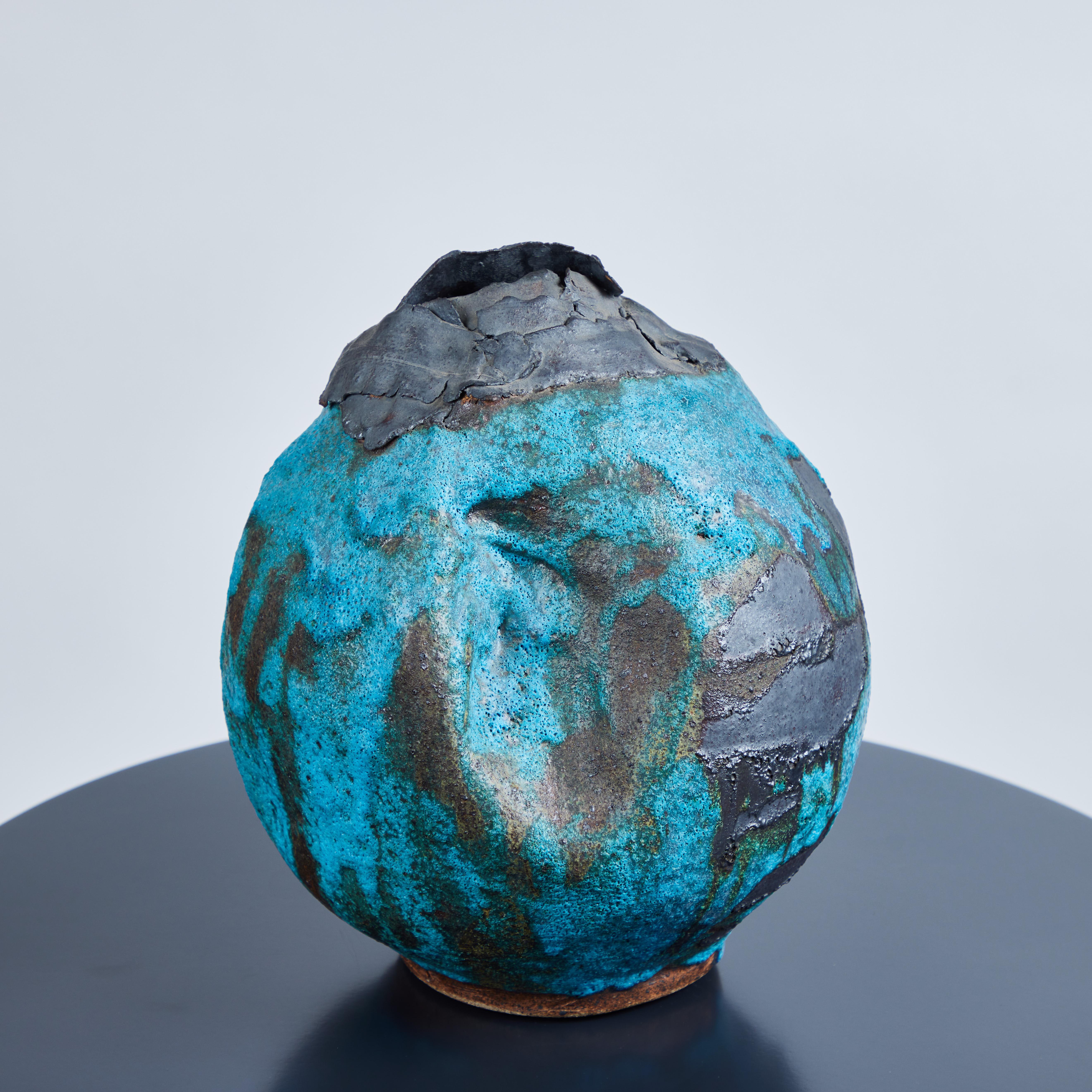 High fired ceramic vessel by Los Angeles artist Caroline Blackburn. This piece is one of her very earliest works, circa early to mic 2000's.