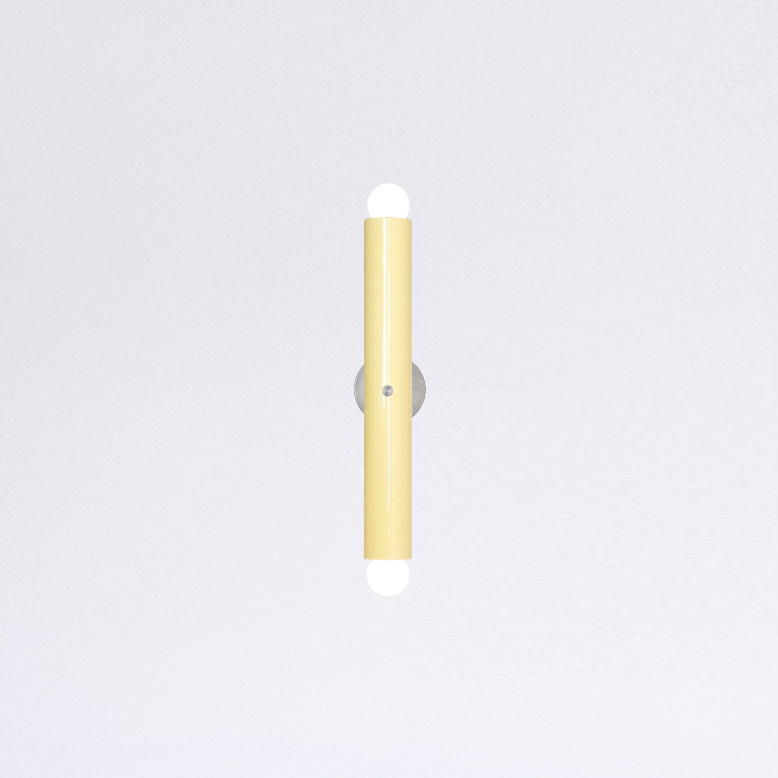 TRN Wall lamp Z1
Designer: Pani Jurek

Model shown in main picture: TRN Z1, Glossy Mellow Yellow
Ceramic tube: 5 cm x 36 cm / 14,17