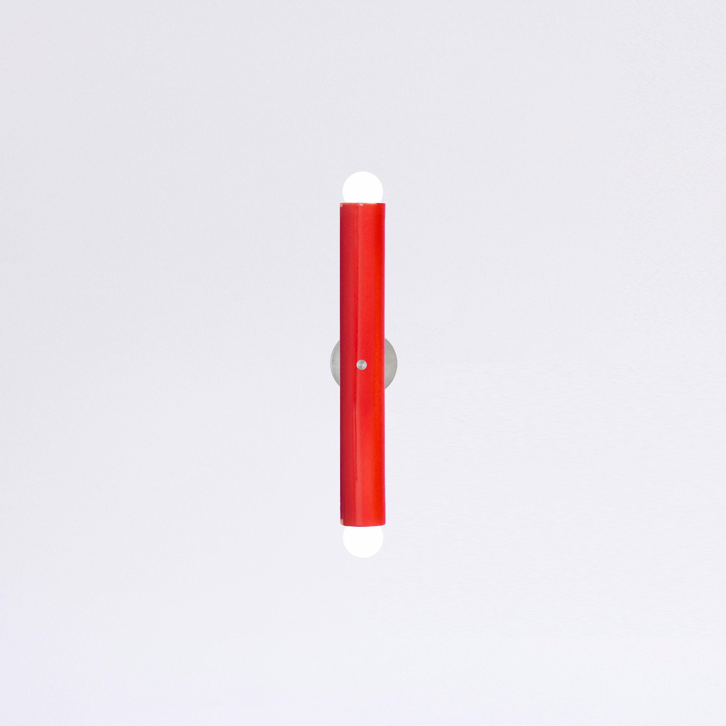 TRN Wall lamp Z1
Designer: Pani Jurek

Model shown in main picture: TRN Z1, Red
Ceramic tube: 5 cm x 36 cm / 14,17