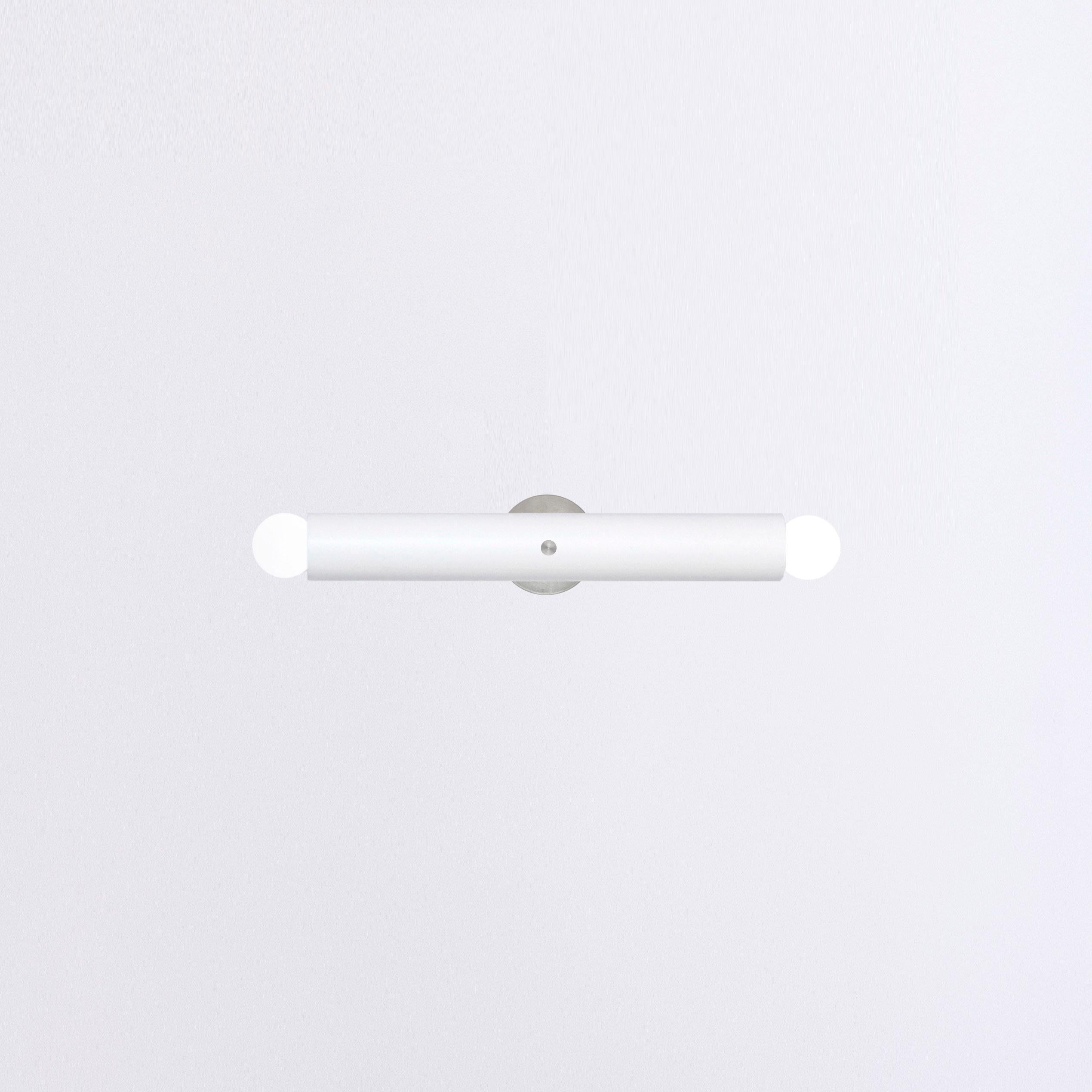 TRN Wall lamp Z1
Designer: Pani Jurek

Model shown in main picture: TRN Z1, White
Ceramic tube: 5 cm x 36 cm / 14,17