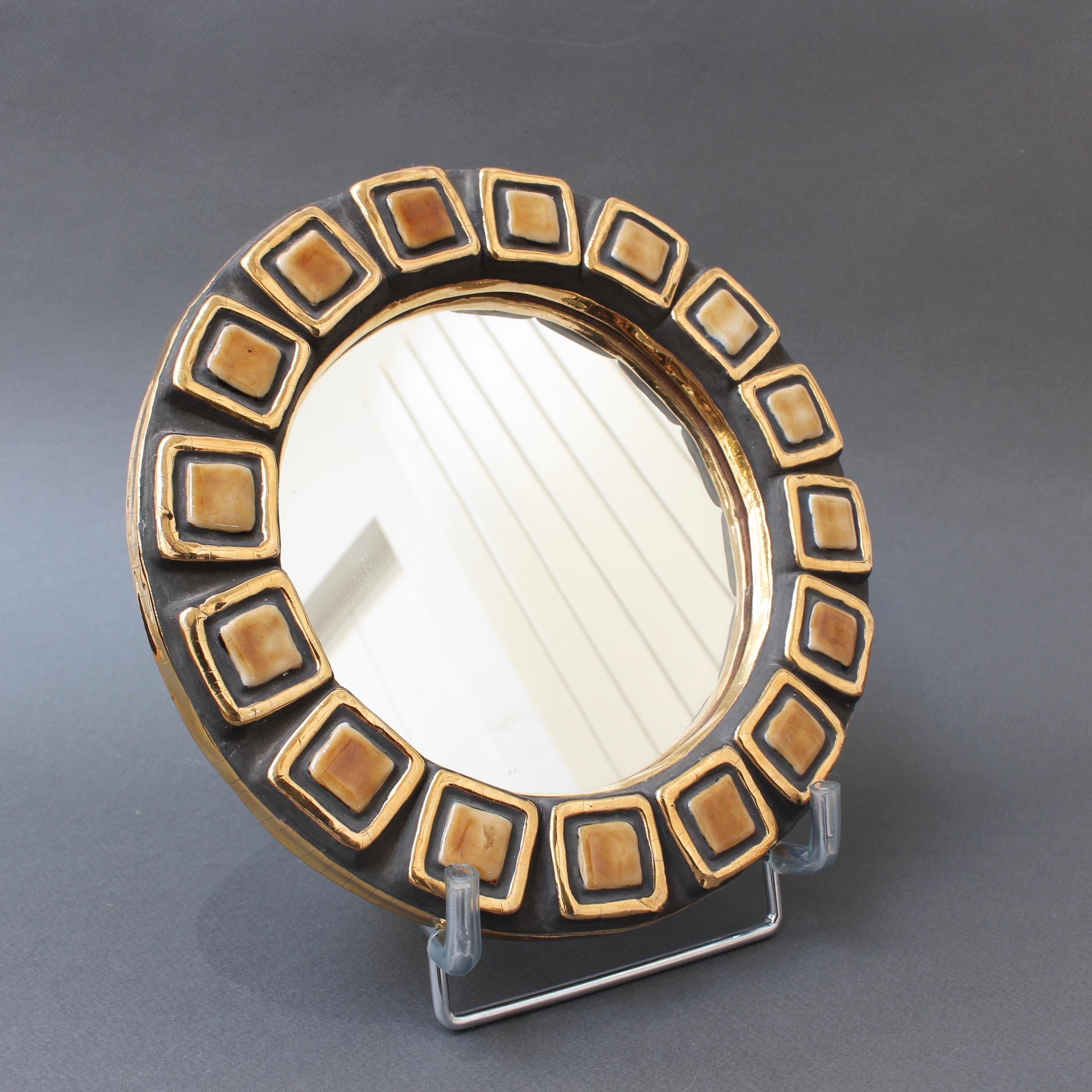 Ceramic wall mirror with a square-within-a-square motif (1952), by Mithé Espelt, titled 