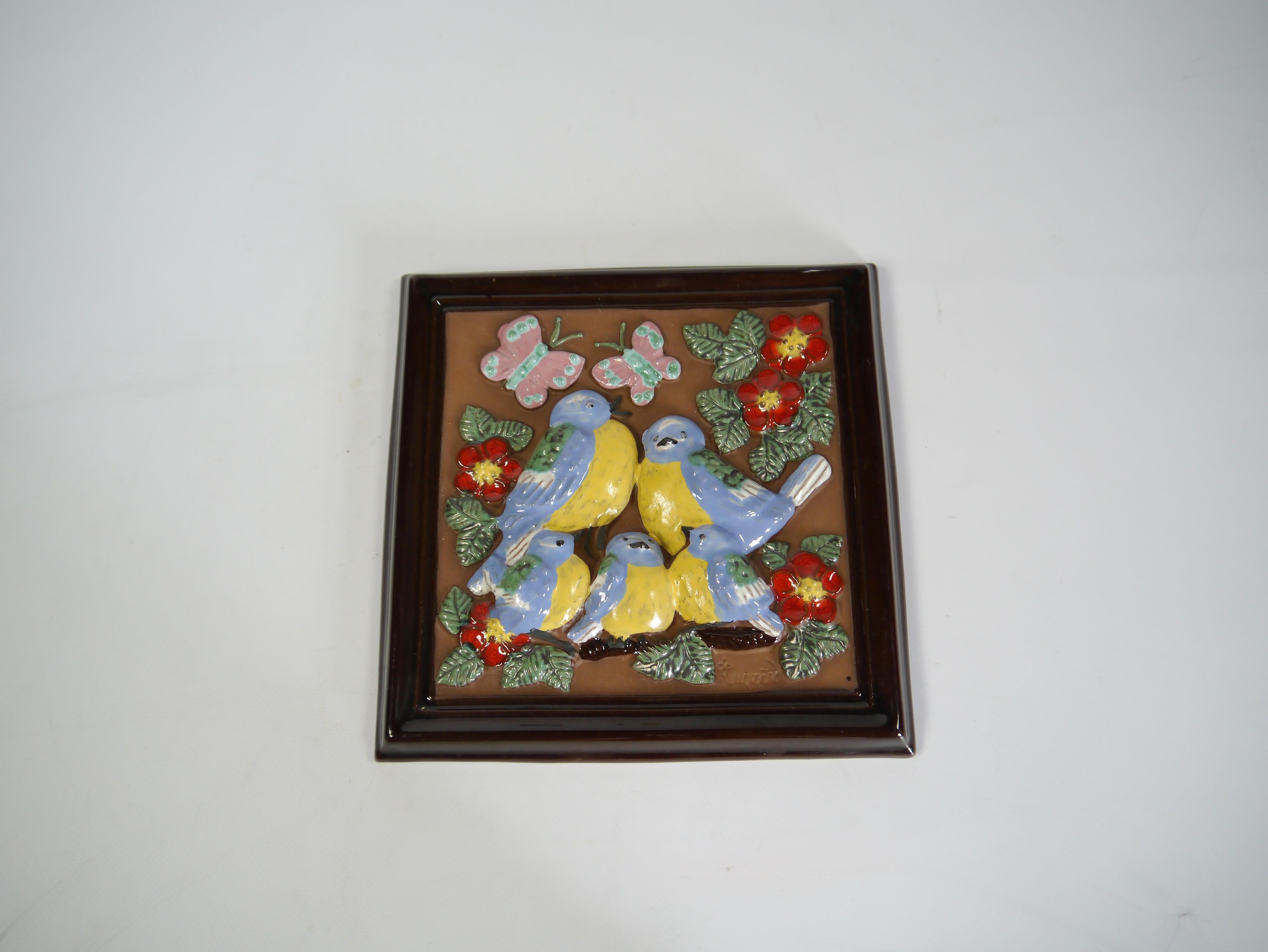 Ceramic wall plaque fabricated by Gabriel Keramik, Sweden 1970s. Depicting a romantic / infantil motif of birds, butterflies & flowers. 