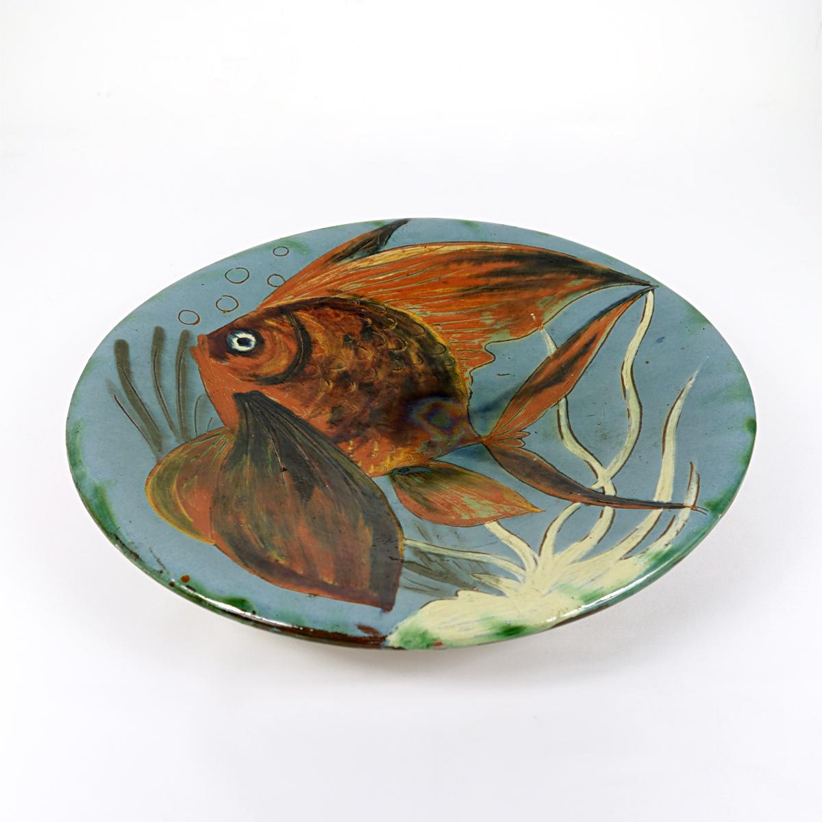 Very colorful and decorative wall plate with a stylized fish.
Designed and made by Puigdemont of Spain.
The plate has a diameter of 35.5 cm (13.8 inch).