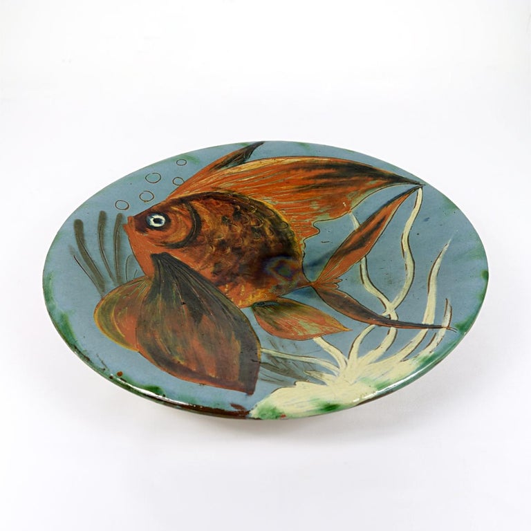 Very colourful and decorative wall plate with a stylized fish.
Designed and made by Puigdemont of Spain.
The plate has a diameter of 35.5 cm (13.8 inch).