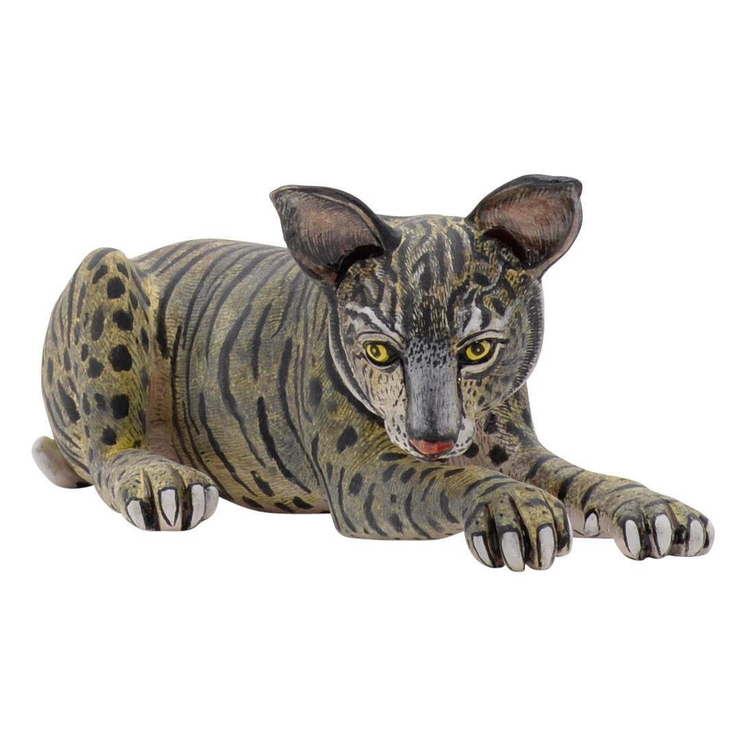 Gatsheni Ceramic Art presents a striking ceramic wildcat sculpture from South Africa. Hand-painted and hand-sculpted, this one-of-a-kind piece boasts a matte finish, showcasing meticulous craftsmanship by two talented artists. The sculpture pays