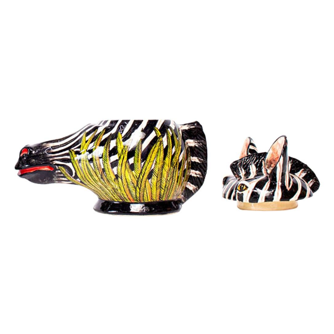Zebra Head Jewelry Box Hand-Painted by Zinhle Nene and Sculpted by Sfiso

Celebrate the enchanting spirit of African wildlife with the Zebra Head Jewelry Box, an exquisite ceramic creation by the talented duo, Zinhle Nene and Sfiso, from Love Art