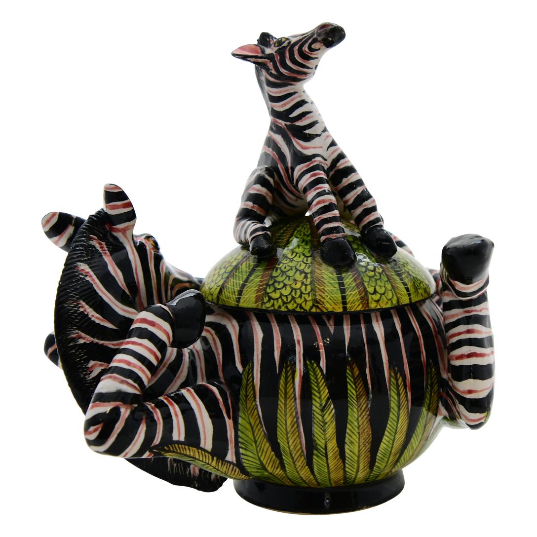Zebra Jewelry Box
Hand-Painted by Zimhle & Sculpted by Sbusiso
Love Art Ceramic, South Africa

Crafted with care by the talented duo Sbusiso and Zimhle at Love Art Ceramic, the Zebra Jewelry Box is a captivating tribute to African artistry.